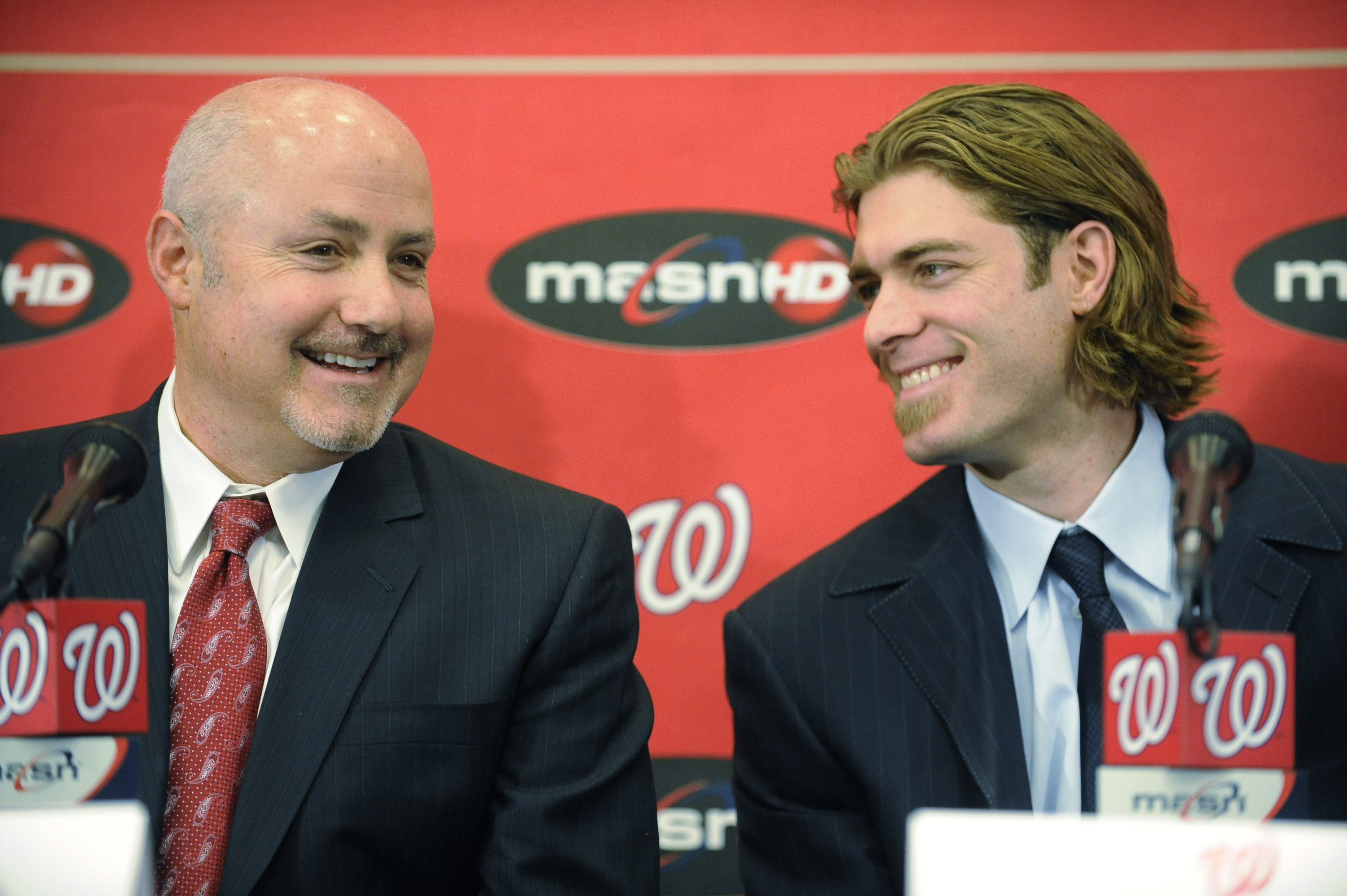 WASHINGTON, DC - DECEMBER 15:  Executive Vice President of Baseball Operations and General Manager Mike Rizzo introduces Jayson Werth #28  of the Washington Nationals to the media on December 15, 2010 at Nationals Park in Washington, DC.   (Photo by Mitch