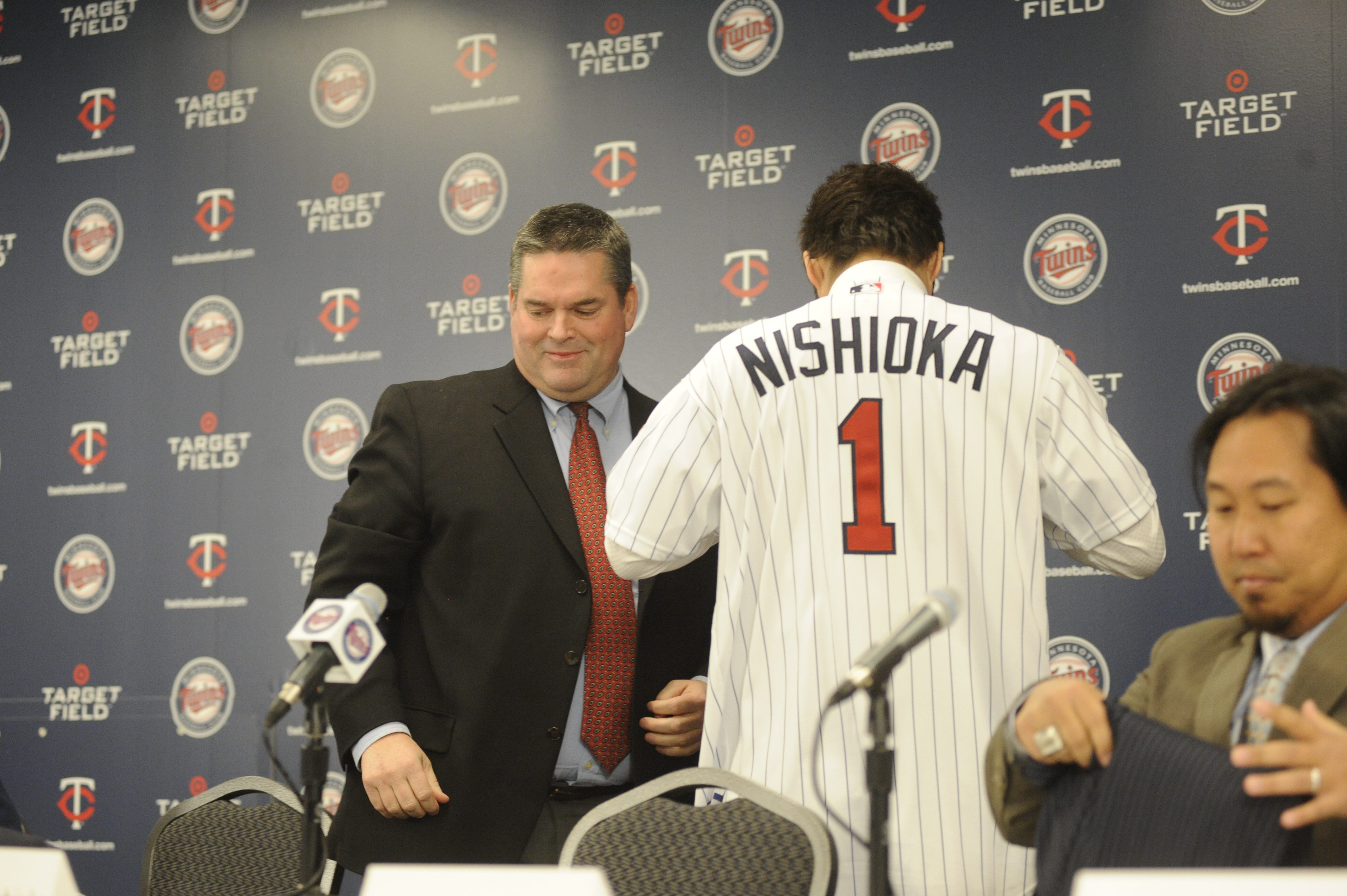 MINNEAPOLIS, MN - DECEMBER 18: Tsuyoshi Nishioka # of the Minnesota Twins puts on his first Twins jersey during a press conference on December 18, 2010 at Target Field in Minneapolis, Minnesota. (Photo by Hannah Foslien /Getty Images)