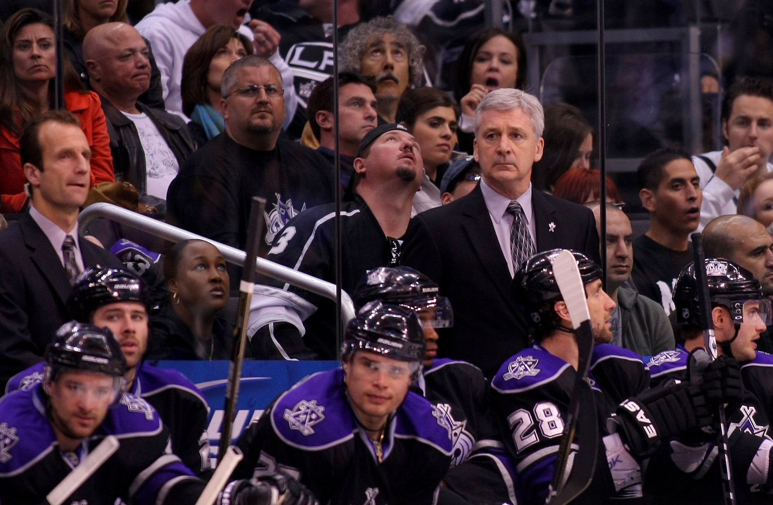 LOS ANGELES, CA - MARCH 21:  Head Coach Terry Murray and Assistant Coach Jamie Kompon look on from behind the bench during their NHL game against the Calgary Flames at Staples Center on March 21, 2011 in Los Angeles, California. The Kings defeated the Fla