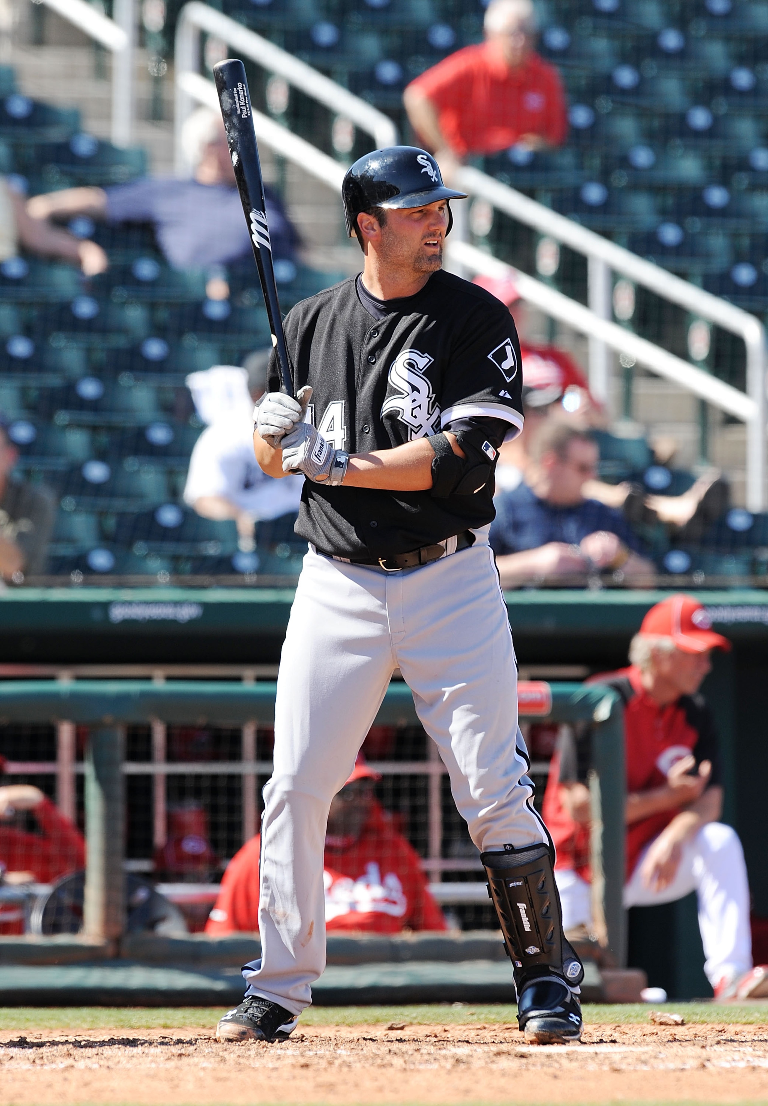 GOODYEAR, AZ - MARCH 02:  Paul Konerko #14 of the Chicago White Sox stands in the batters box against the Cincinnati Reds during a spring training game at Goodyear Ballpark on March 2, 2011 in Goodyear, Arizona.  (Photo by Norm Hall/Getty Images)