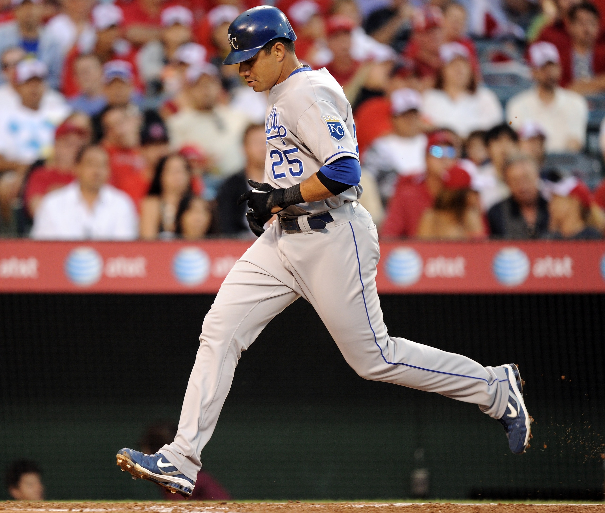 ANAHEIM, CA - AUGUST 10: Kila Ka'aihue #25 of the Kansas City Royals scores a run for a 1-1 tie with the Los Angeles Angels during the second inning at Angel Stadium on August 10, 2010 in Anaheim, California.  (Photo by Harry How/Getty Images)