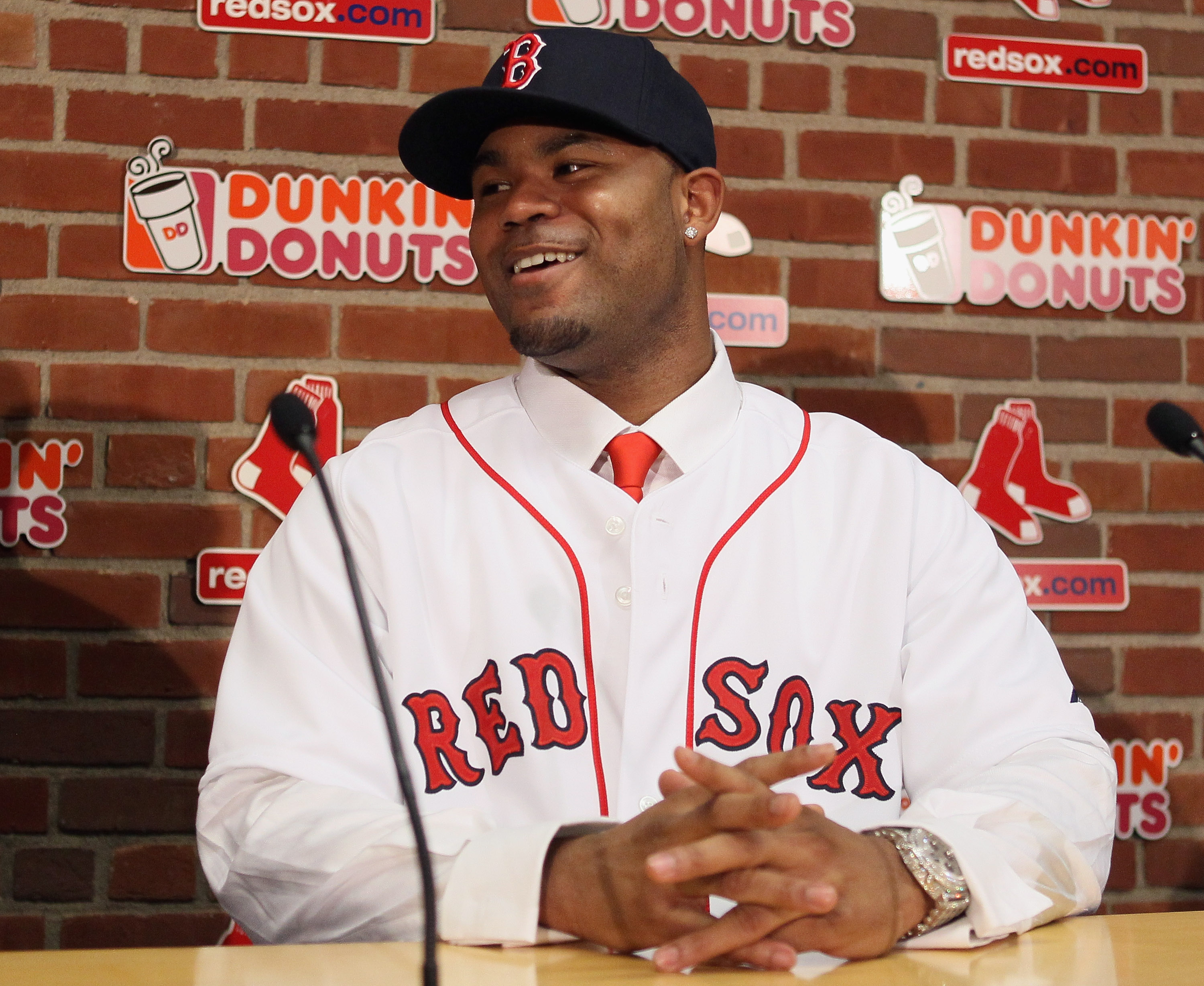 BOSTON, MA - DECEMBER 11:  Carl Crawford answers questions during a press conference to announce his joining the Boston Red Sox on December 11,  2010 at the Fenway Park in Boston, Massachusetts.  (Photo by Elsa/Getty Images)