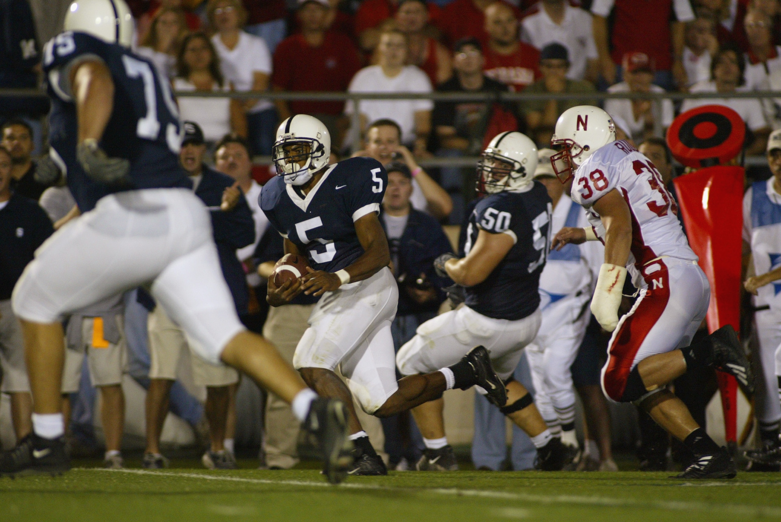UNIVERSITY PARK, PA - SEPTEMBER 14:  Larry Johnson #6 of Penn State runs with the ball during the NCAA football game against Nebraska at Beaver Stadium in University Park, Pennsylvania on September 14, 2002. The Penn State Nittany Lions defeated the Nebra
