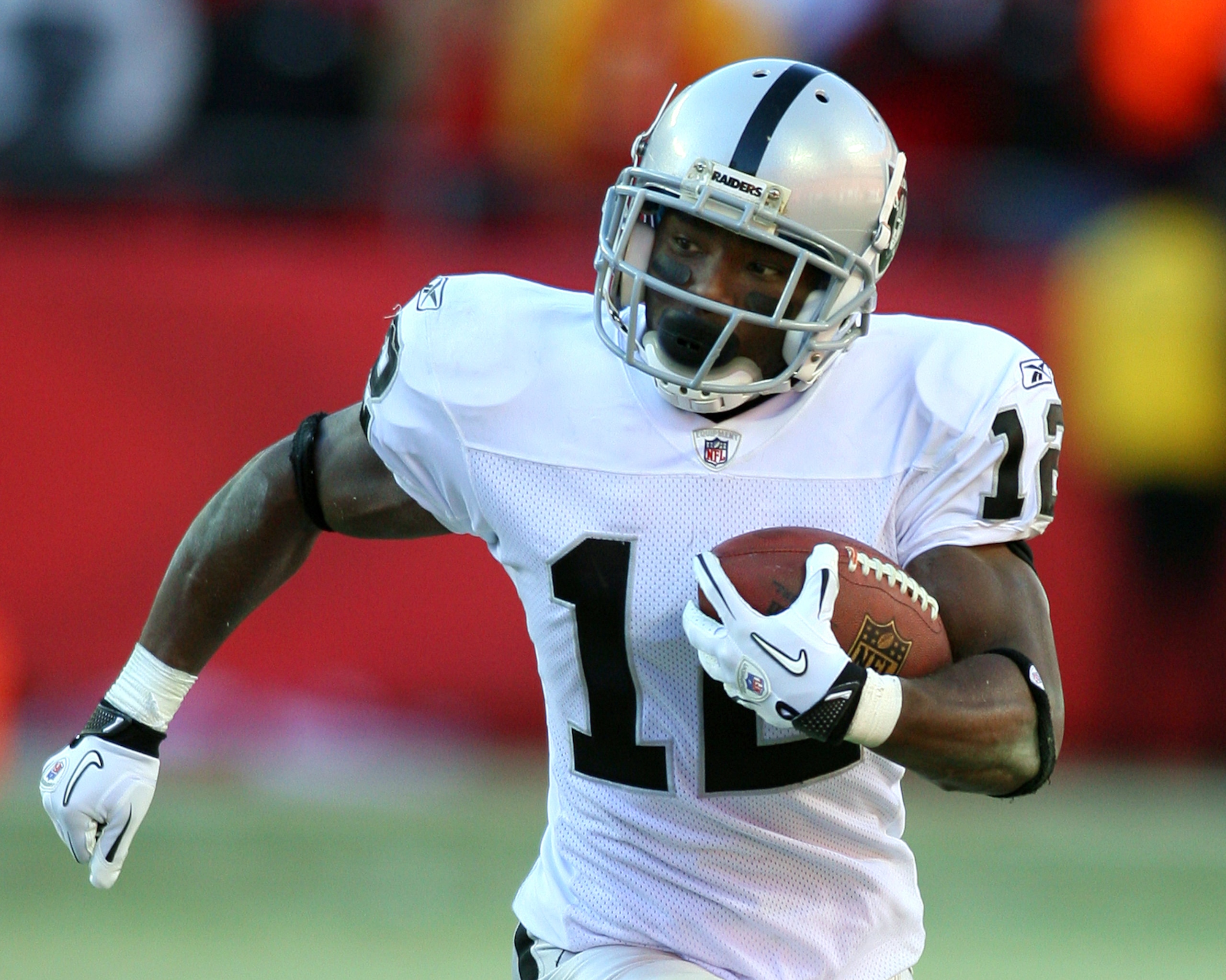 KANSAS CITY, MO - JANUARY 02:  Wide receiver Jacoby Ford #12 of the Oakland Raiders runs down field in a game against the Kansas City Chiefs at Arrowhead Stadium on January 2, 2011 in Kansas City, Missouri.  (Photo by Tim Umphrey/Getty Images)