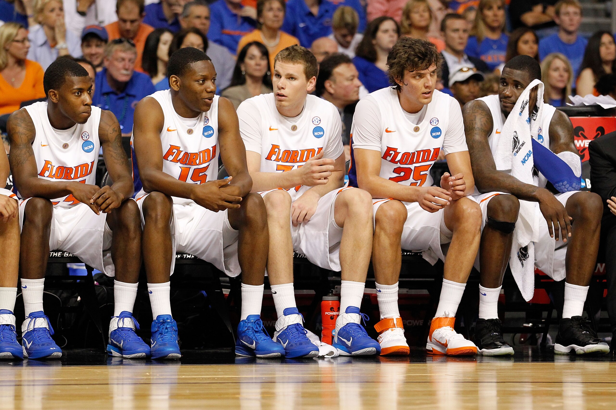 TAMPA, FL - MARCH 19:  (L-R) Casey Prather #24, Will Yeguete #15, Erik Murphy #33, Chandler Parsons #25 and Vernon Macklin #32 of the Florida Gators look on from the bench against the UCLA Bruins during the third round of the 2011 NCAA men's basketball to