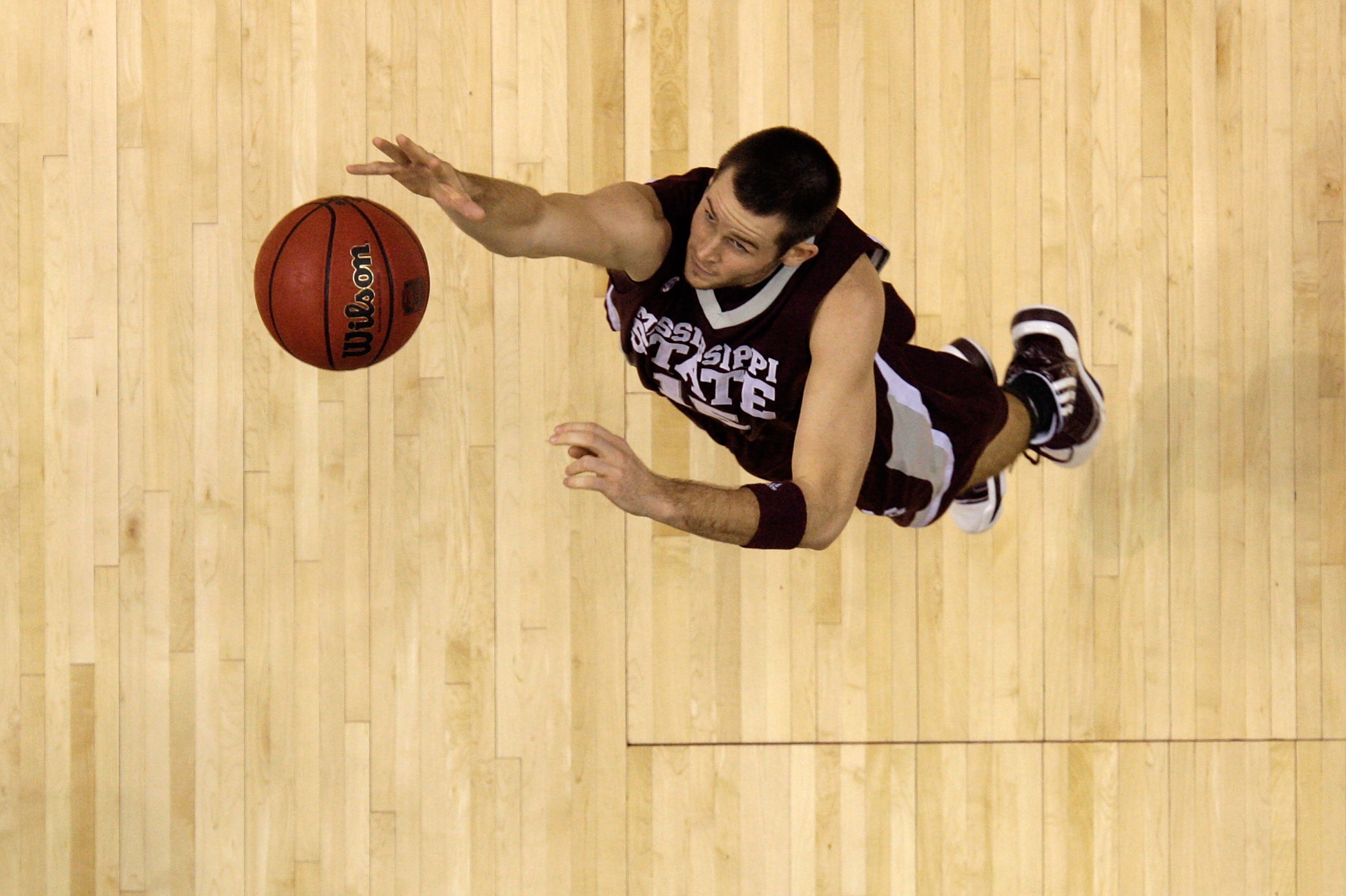 NASHVILLE, TN - MARCH 14: Riley Benock #15 of the Mississippi State Bulldogs reaches for a rebound against the Kentucky Wildcats during the final of the SEC Men's Basketball Tournament at the Bridgestone Arena on March 14, 2010 in Nashville, Tennessee. K