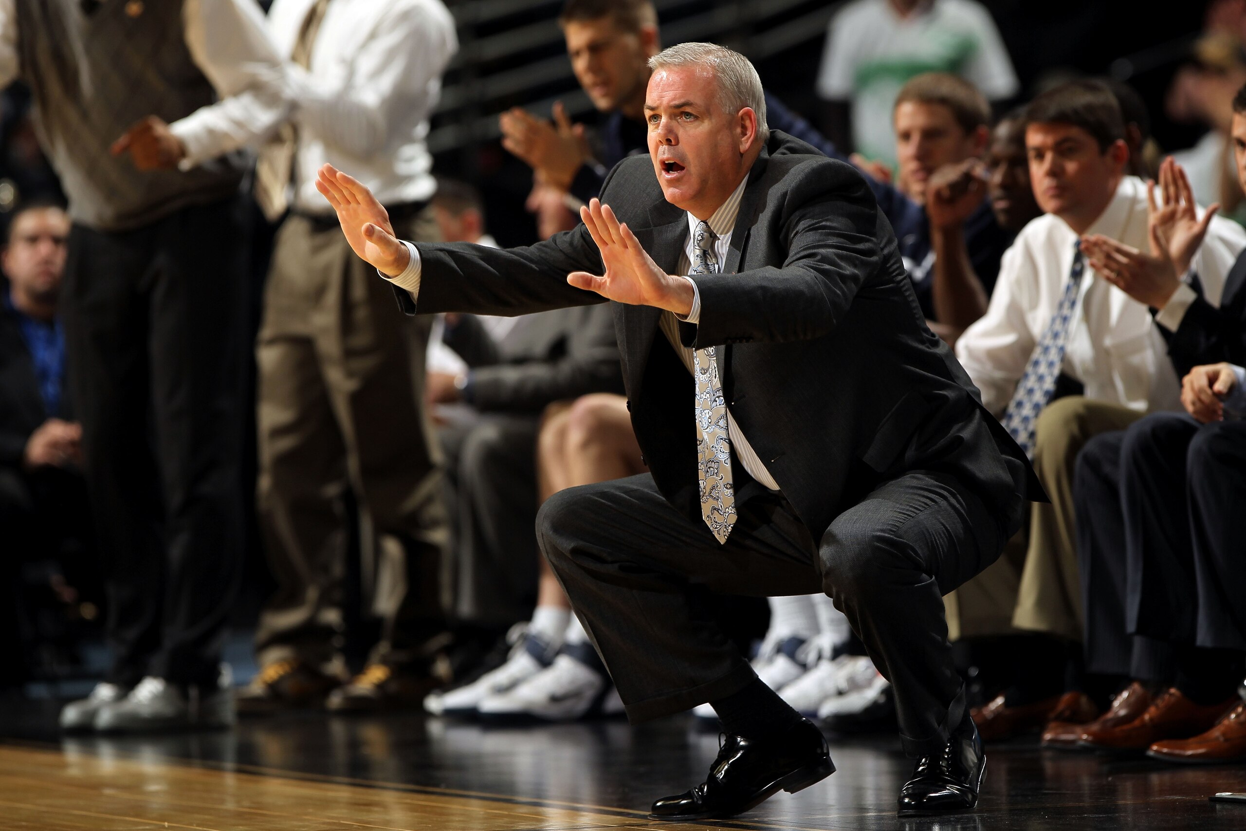 DENVER, CO - MARCH 19: Head coach Dave Rose of the Brigham Young Cougars gestures from the bench against the Gonzaga Bulldogs during the third round of the 2011 NCAA men's basketball tournament at Pepsi Center on March 19, 2011 in Denver, Colorado. (Pho DENVER, CO - MARCH 19: Head coach Dave Rose of the Brigham Young Cougars gestures from the bench against the Gonzaga Bulldogs during the third round of the 2011 NCAA men's basketball tournament at Pepsi Center on March 19, 2011 in Denver, Colorado. (Pho