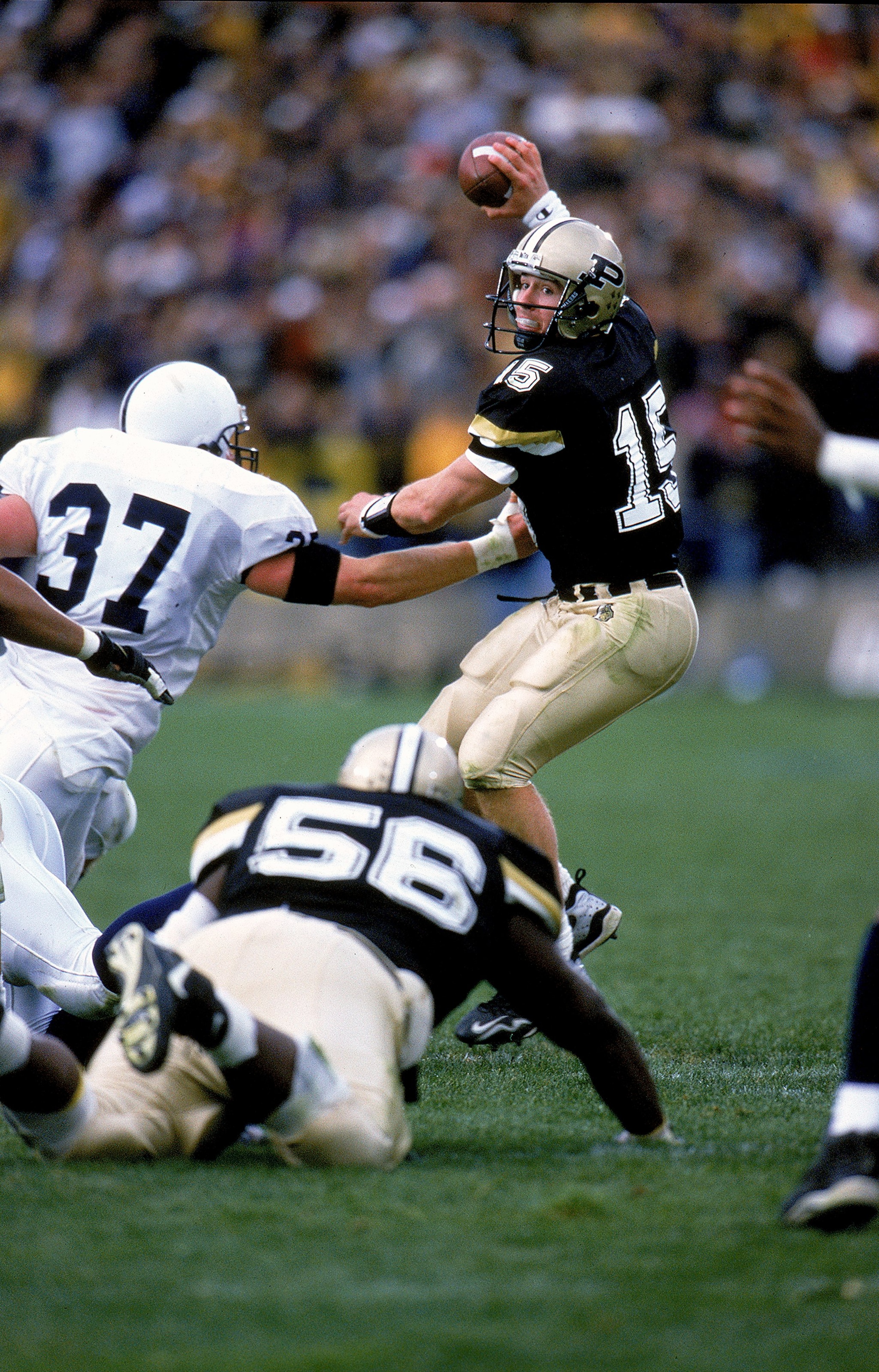 23 Oct 1999:  Drew Brees #15 of the Purdue Boilermakers moves back to avoid a sack during the game against the Penn State Nittany Lions at the Ross-Ade Stadium in West Lafayette, Indiana. The Nittany Lions defeated the Boilermakers 31-25. Mandatory Credit
