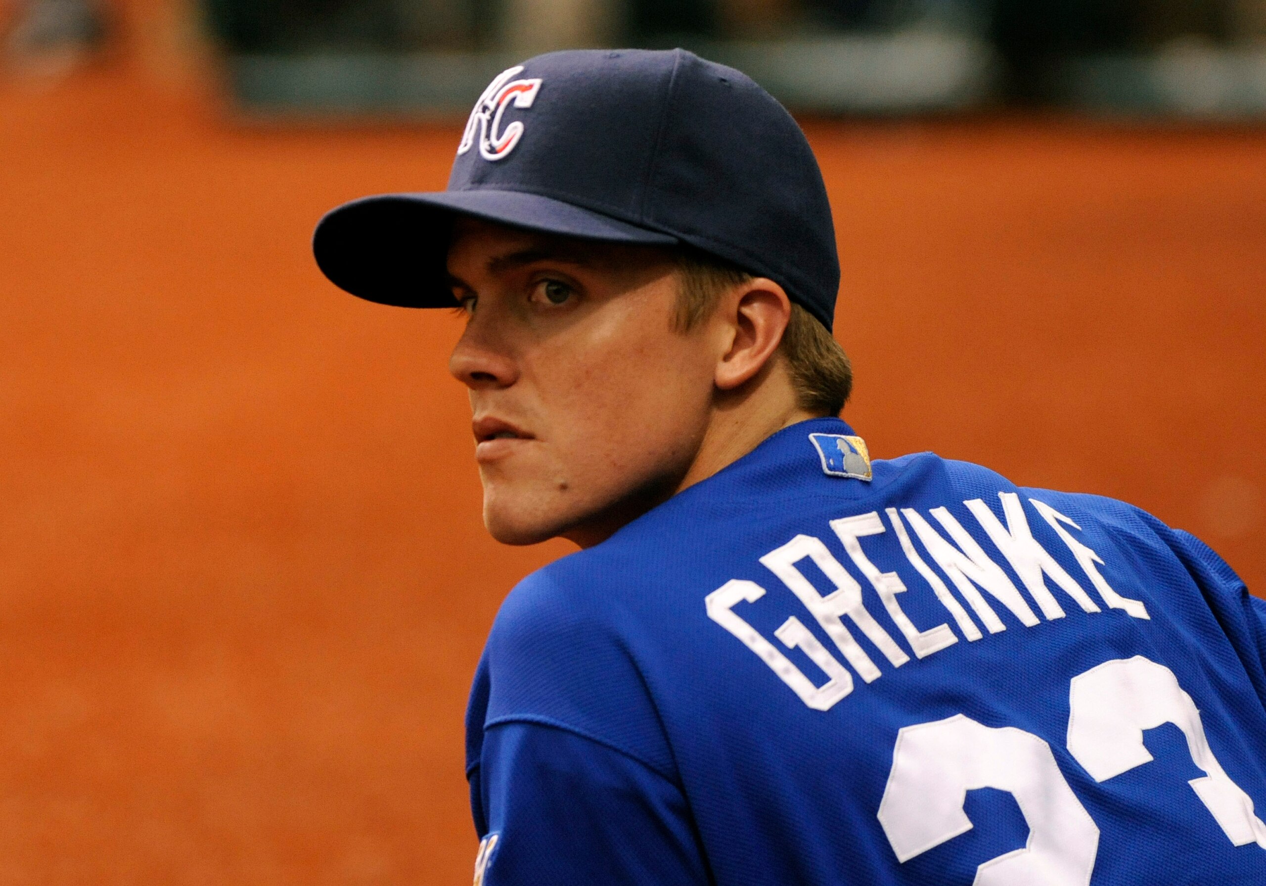 ST. PETERSBURG, FL - JULY 6:  Pitcher Zack Greinke #23 of the Kansas City Royals checks the bullpen against the Tampa Bay Rays July 6, 2008 at Tropicana Field in St. Petersburg, Florida. The Rays defeated the Royals 9-2.  (Photo by Al Messerschmidt/Getty