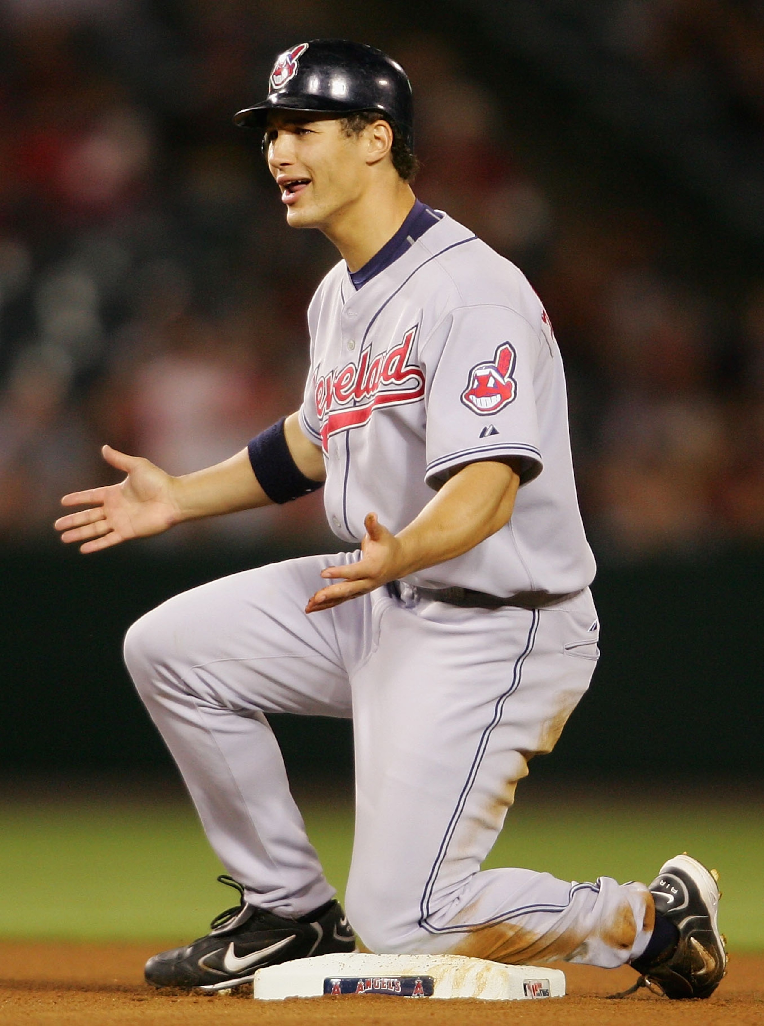 ANAHEIM, CA - MAY 9:  Grady Sizemore #24 of the Cleveland Indians appeals to the umpire after being tagged out by Adam Kennedy #2 of the Los Angeles Angels of Anaheim at Angel Stadium on May 9, 2005 in Anaheim, California. (Photo by Nick Laham/Getty Image