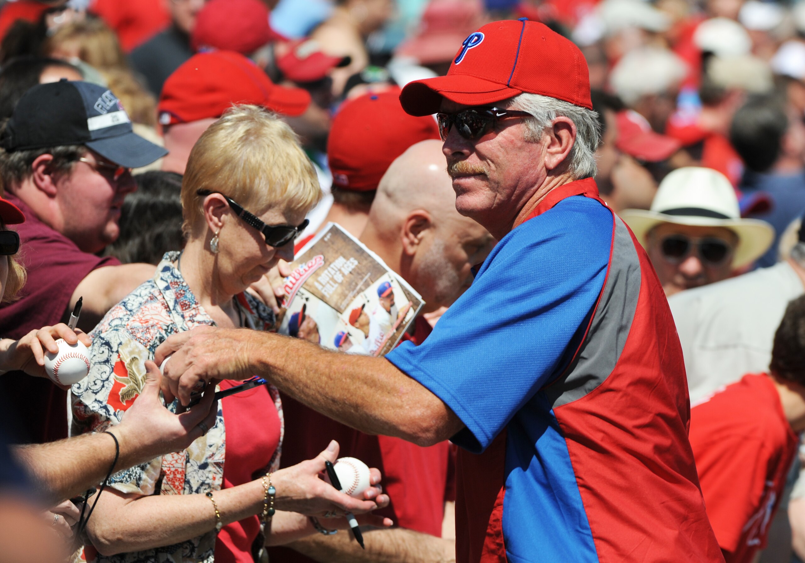 CLEARWATER, FL - FEBRUARY 27:  Hall of Famer Mike Schmidt of the Philadelphia Phillies signs an autograph before play against the New York Yankees February 27, 2011 at Bright House Field in Clearwater, Florida.  (Photo by Al Messerschmidt/Getty Images)