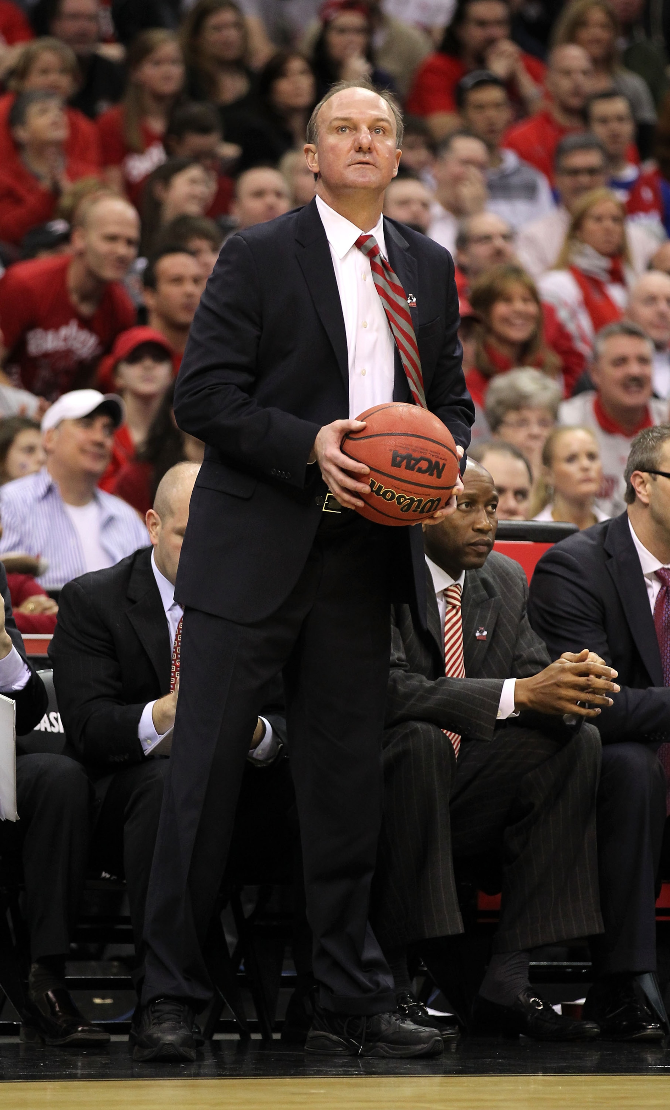 CLEVELAND, OH - MARCH 20: Head coach Thad Matta of the Ohio State Buckeyes holds the ball on the bench during the first half against the George Mason Patriots during the third of the 2011 NCAA men's basketball tournament at Quicken Loans Arena on March 20