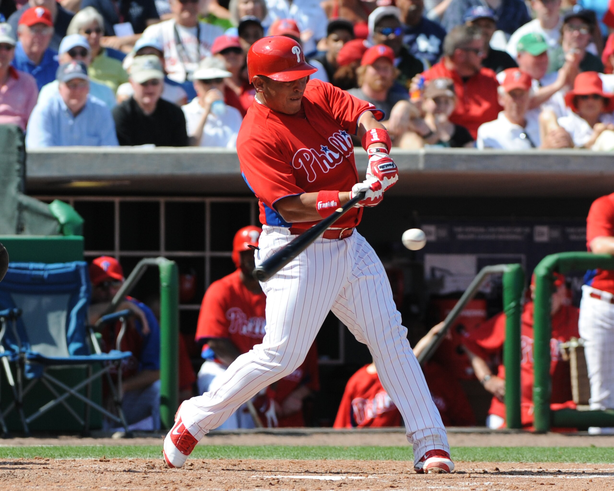 CLEARWATER, FL - FEBRUARY 27:  Catcher Carlos Ruiz #51 of the  Philadelphia Phillies bats against the New York Yankees February 27, 2011 at Bright House Field in Clearwater, Florida.  (Photo by Al Messerschmidt/Getty Images)