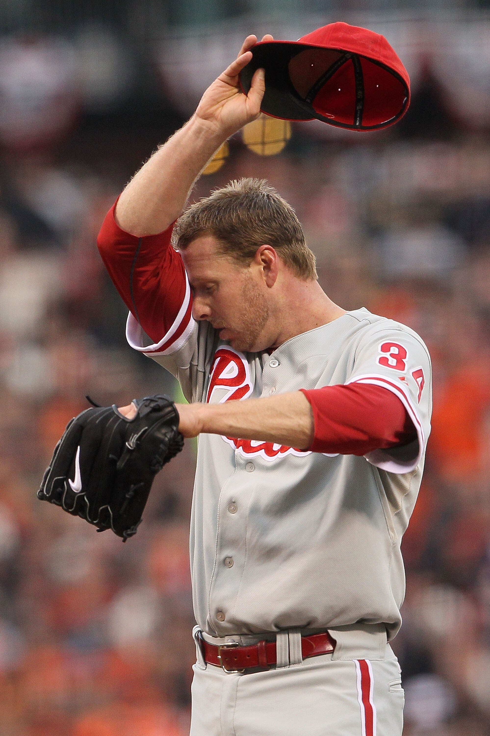 SAN FRANCISCO - OCTOBER 21:  Roy Halladay #34 of the Philadelphia Phillies reacts on the mound during Game Five of the NLCS against the San Francisco Giants during the 2010 MLB Playoffs at AT&T Park on October 21, 2010 in San Francisco, California.  (Phot