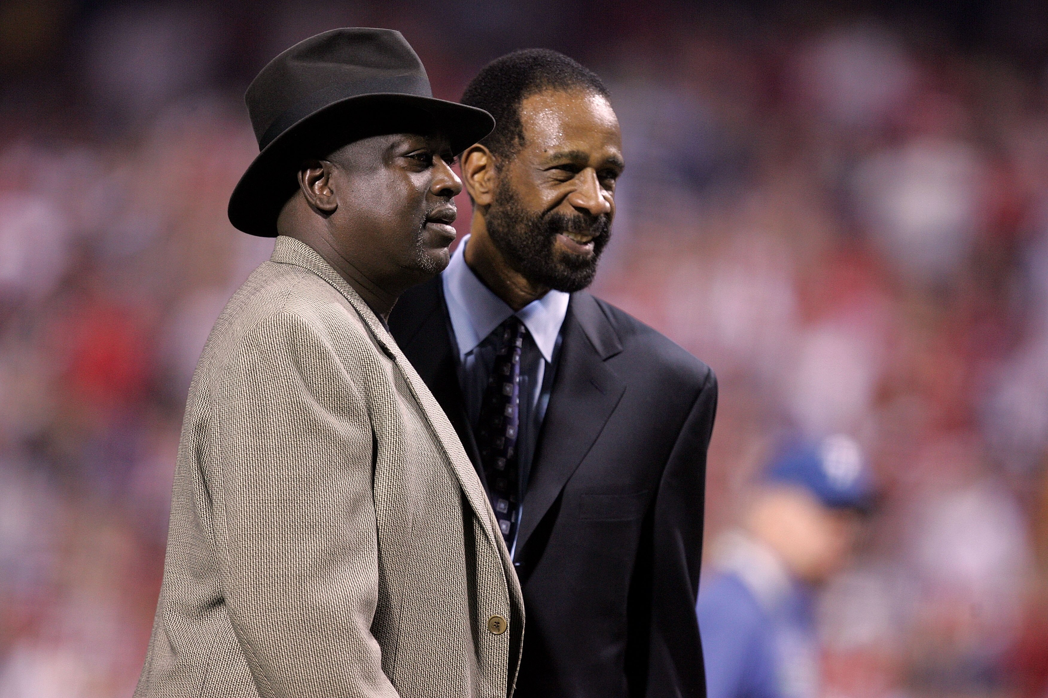 PHILADELPHIA - OCTOBER 9:  Former Philadelphia Phillies Garry Maddox (R) and Gary Matthews throw out the ceremonial first pitch prior to Game One of the National League Championship Series between the Los Angeles Dodgers and the Philadelphia Phillies duri