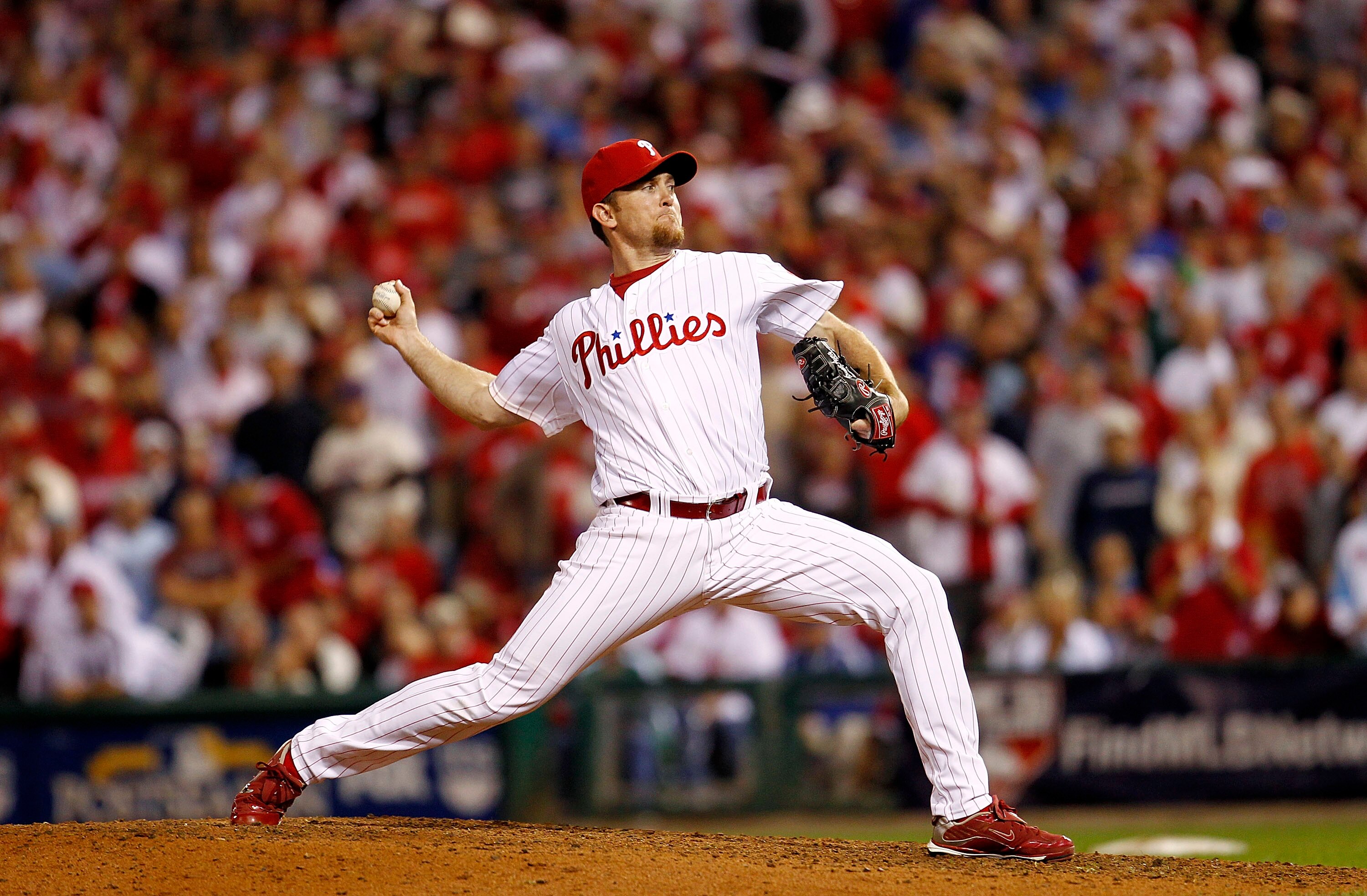 PHILADELPHIA - OCTOBER 08:  Brad Lidge #54 of the Philadelphia Phillies pitches against the Cincinnati Reds in Game 2 of the NLDS at Citizens Bank Park on October 8, 2010 in Philadelphia, Pennsylvania.  (Photo by Jeff Zelevansky/Getty Images)
