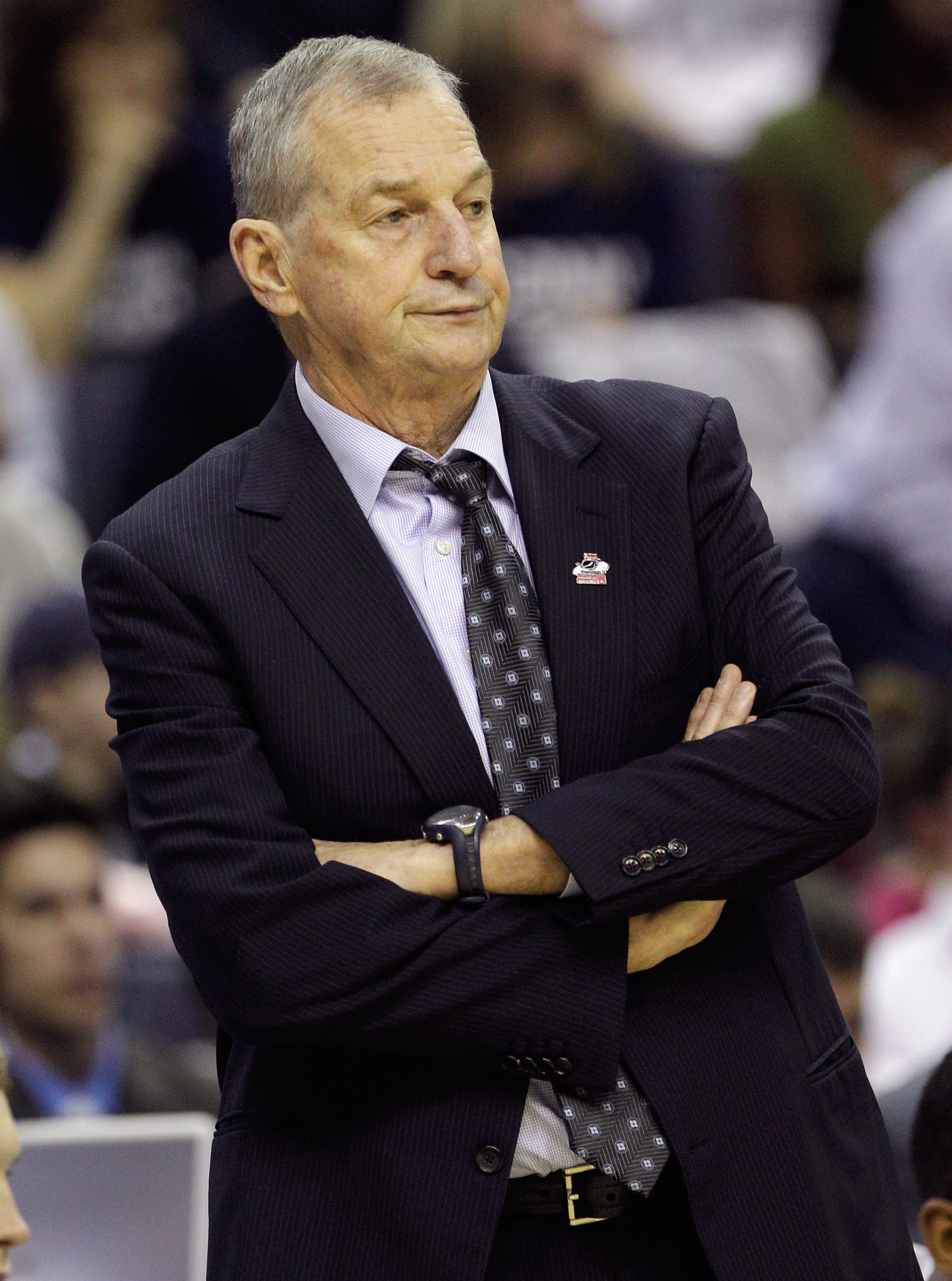 WASHINGTON - MARCH 19: Jim Calhoun, head coach of the Connecticut men's basketball team watches early action against Cincinnatti during the third round of the 2011 NCAA men's basketball tournament at Verizon Center on March 19, 2011 in Washington, DC.  (P