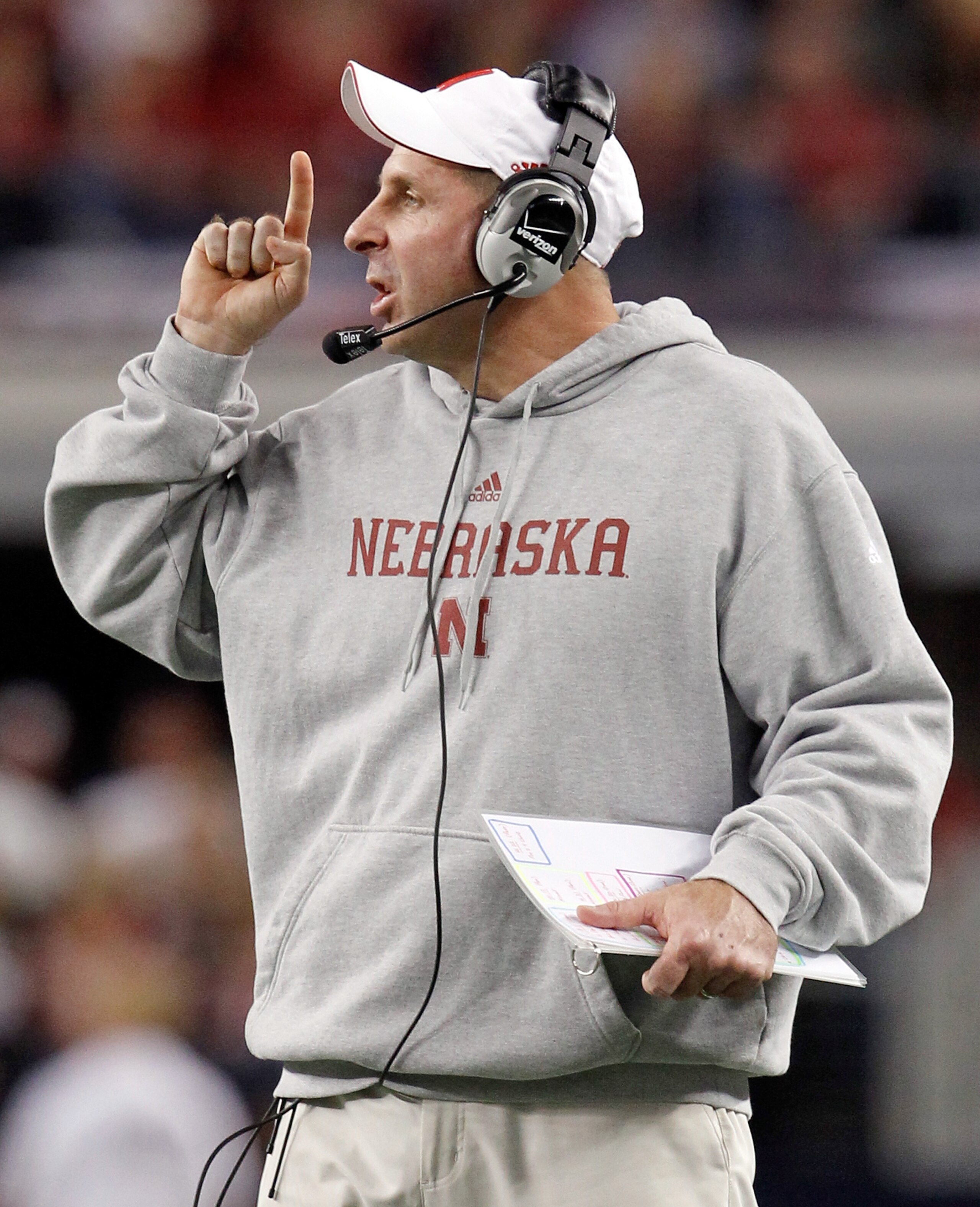 ARLINGTON, TX - DECEMBER 04:  Head coach Bo Pelini of the Nebraska Cornhuskers leads his team against the Oklahoma Sooners at Cowboys Stadium on December 4, 2010 in Arlington, Texas. The Sooners beat the Cornhuskers 23-20.  (Photo by Tom Pennington/Getty