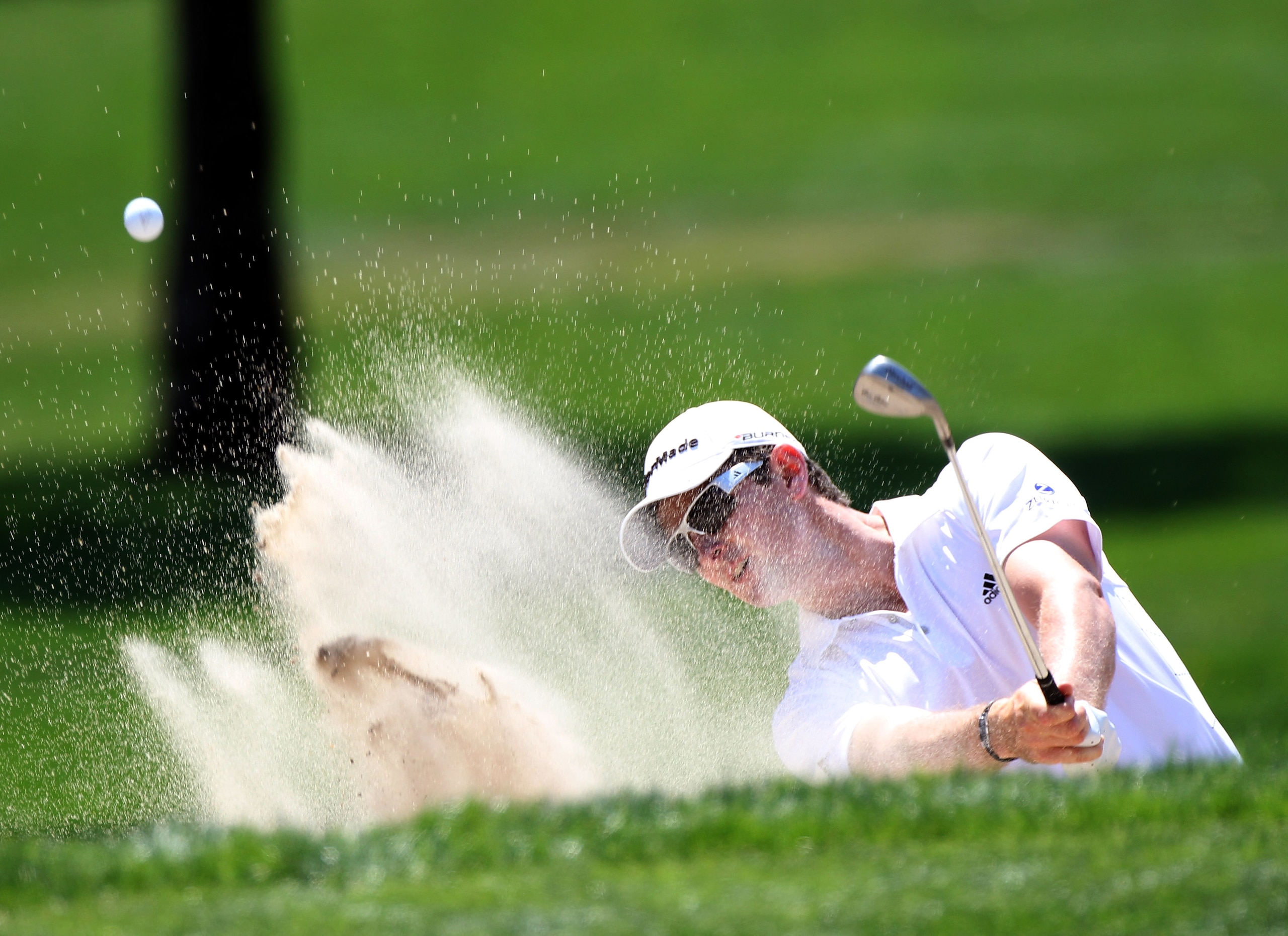 PALM HARBOR, FL - MARCH 20:  Justin Rose of England plays a shot on the 2nd hole during the final round of the Transitions Championship at Innisbrook Resort and Golf Club on March 20, 2011 in Palm Harbor, Florida.  (Photo by Sam Greenwood/Getty Images)