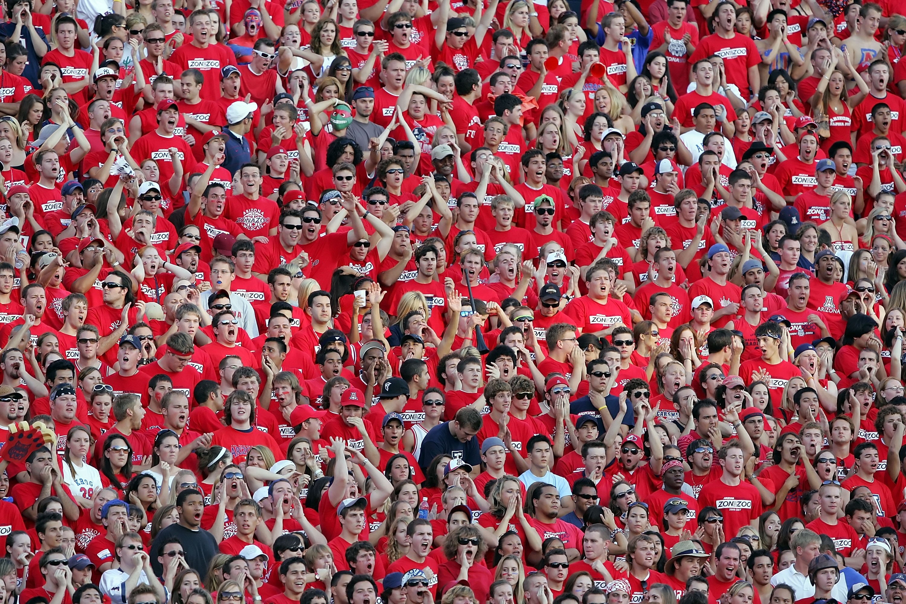 TUCSON, AZ - SEPTEMBER 23:  The Zona Zoo, the student section for the Arizona Wildcats, cheers on their team against the USC Trojans during the game at Arizona Stadium on September 23, 2006 in Tucson, Arizona.  (Photo by Lisa Blumenfeld/Getty Images)