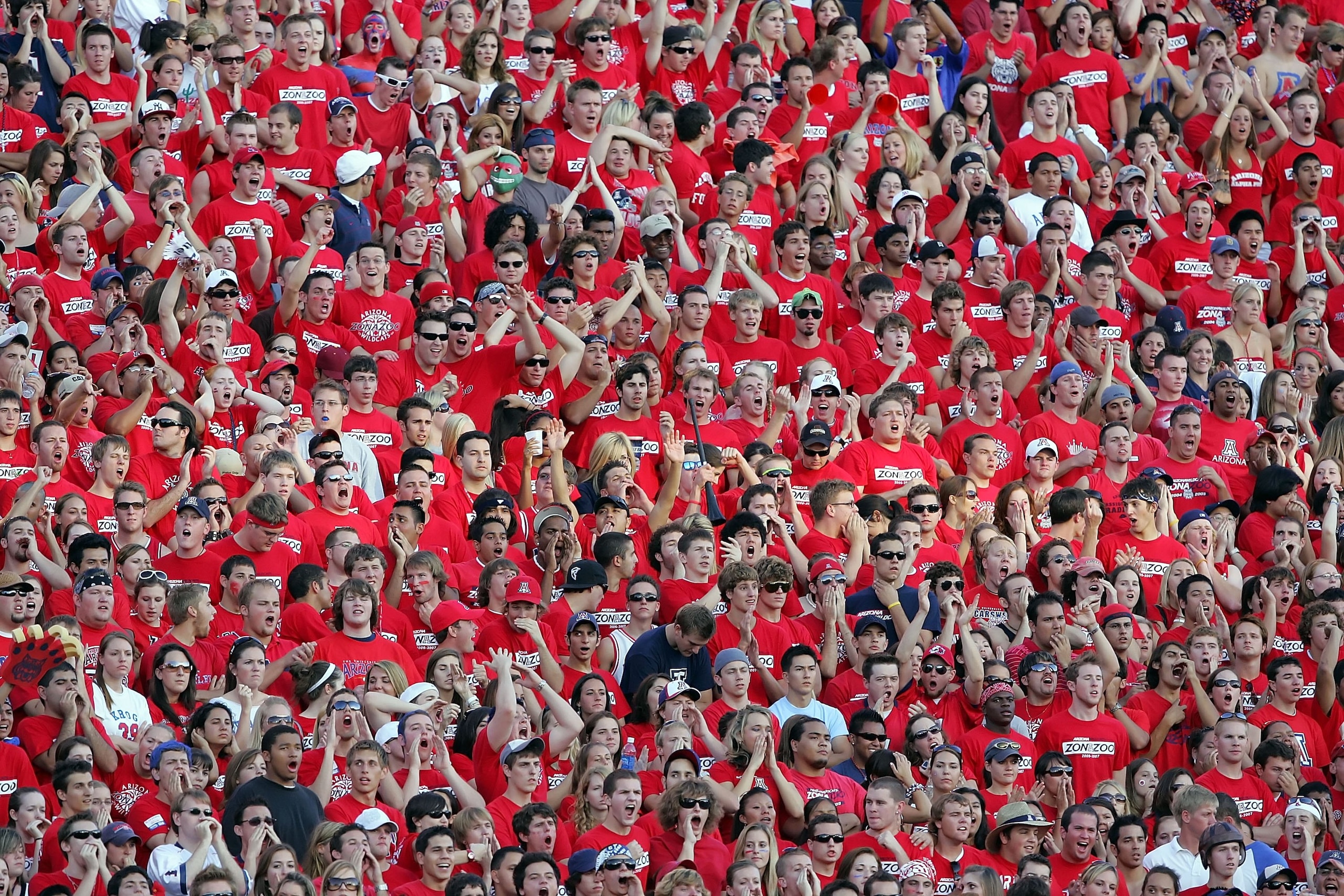 TUCSON, AZ - SEPTEMBER 23:  The Zona Zoo, the student section for the Arizona Wildcats, cheers on their team against the USC Trojans during the game at Arizona Stadium on September 23, 2006 in Tucson, Arizona.  (Photo by Lisa Blumenfeld/Getty Images)