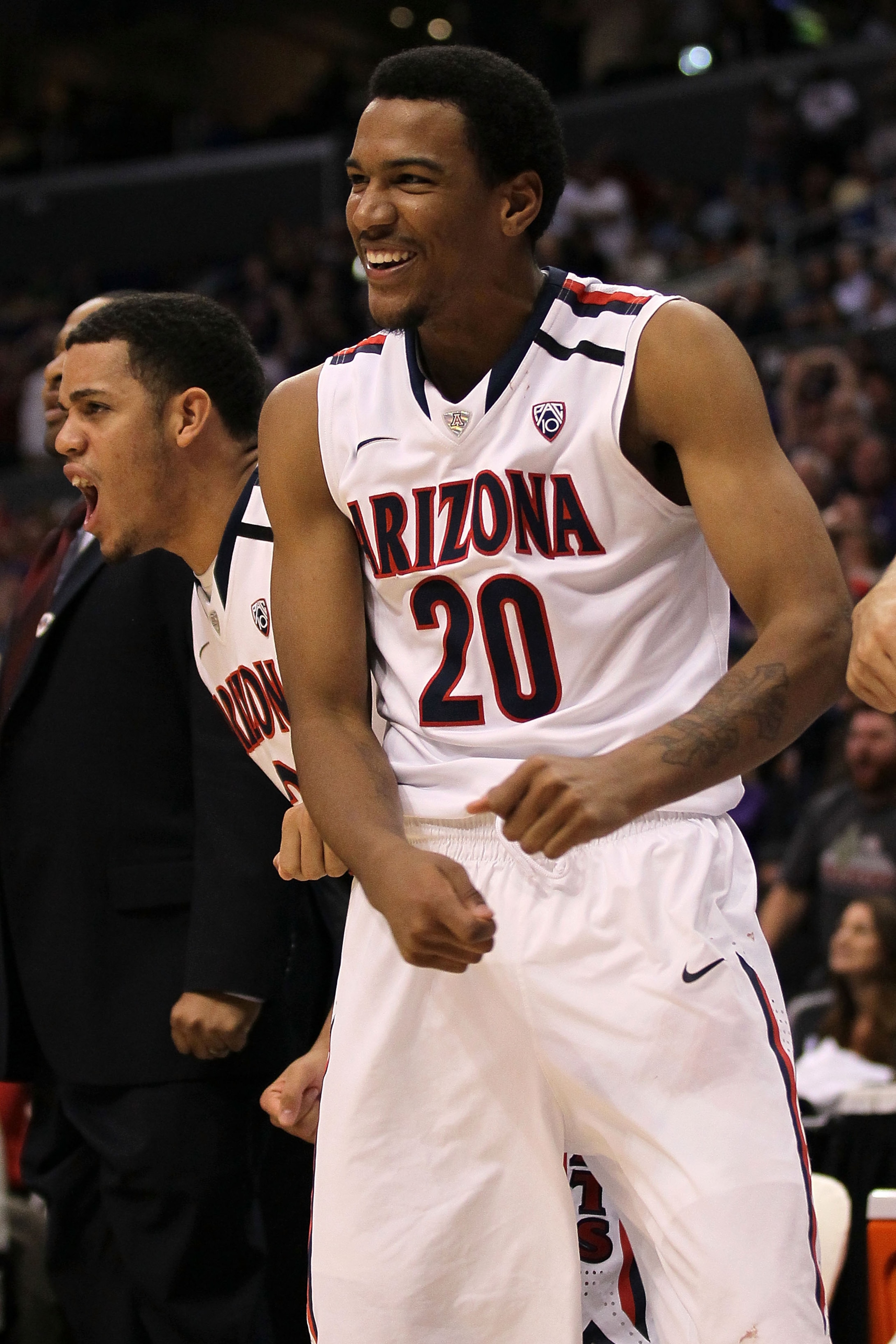 LOS ANGELES, CA - MARCH 12:  Jordin Mayes #20 of the Arizona Wildcats reacts from the bench while taking on the Washington Huskies in the championship game of the 2011 Pacific Life Pac-10 Men's Basketball Tournament at Staples Center on March 12, 2011 in