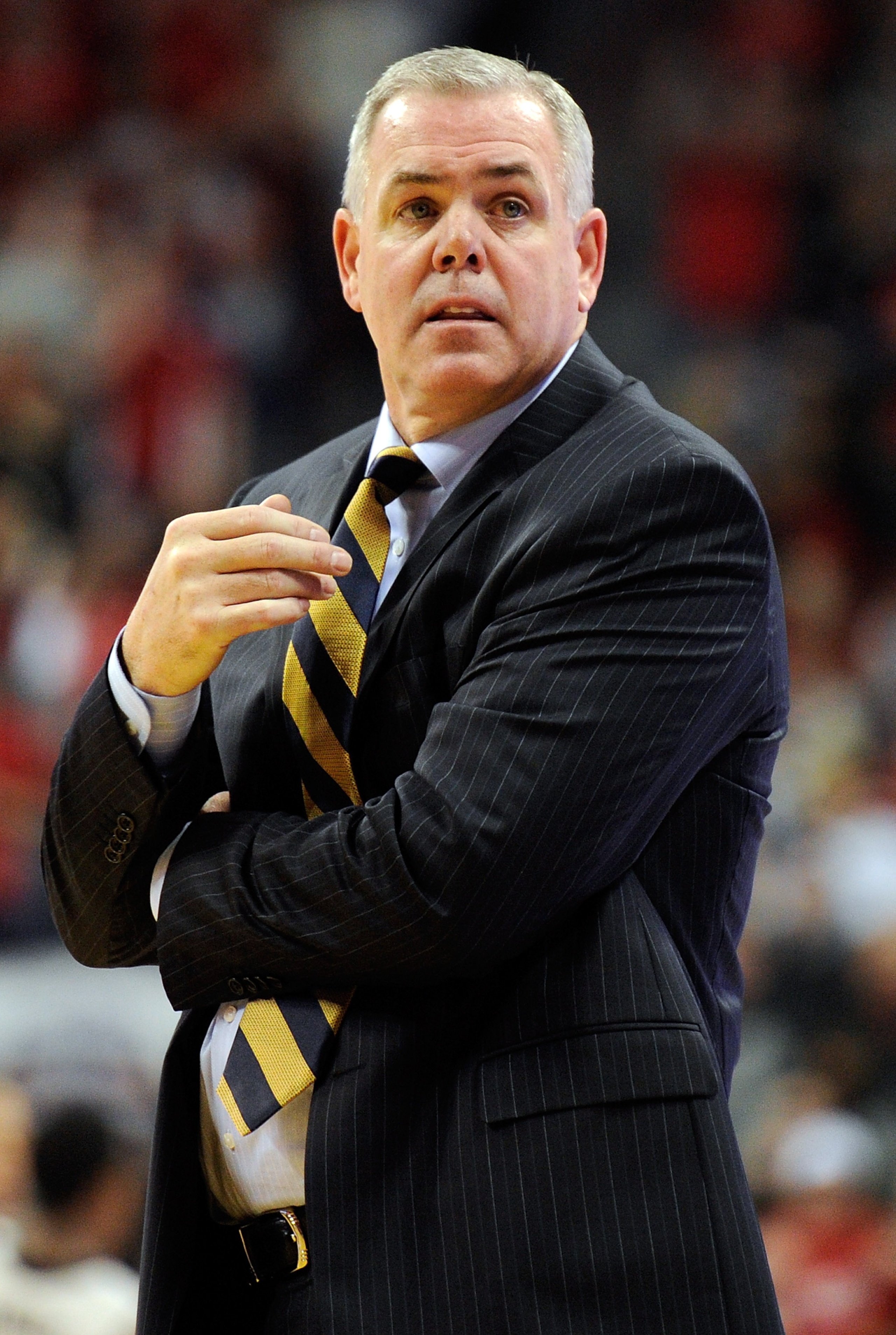 LAS VEGAS, NV - JANUARY 05:  Head coach Dave Rose of the Brigham Young University Cougars watches his players during their game against the UNLV Rebels at the Thomas & Mack Center January 5, 2011 in Las Vegas, Nevada. BYU won 89-77.  (Photo by Ethan Mille