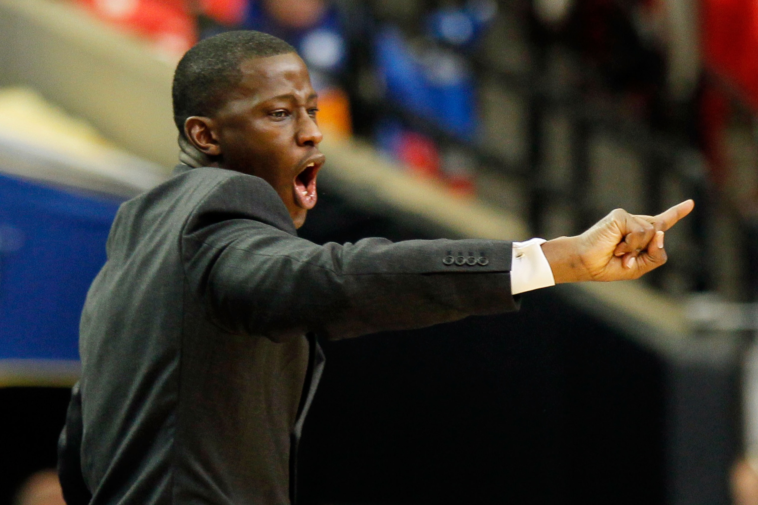 ATLANTA, GA - MARCH 12:  Head coach Anthony Grant of the Alabama Crimson Tide coaches against the Kentucky Wildcats during the semifinals of the SEC Men's Basketball Tournament at Georgia Dome on March 12, 2011 in Atlanta, Georgia.  (Photo by Kevin C. Cox