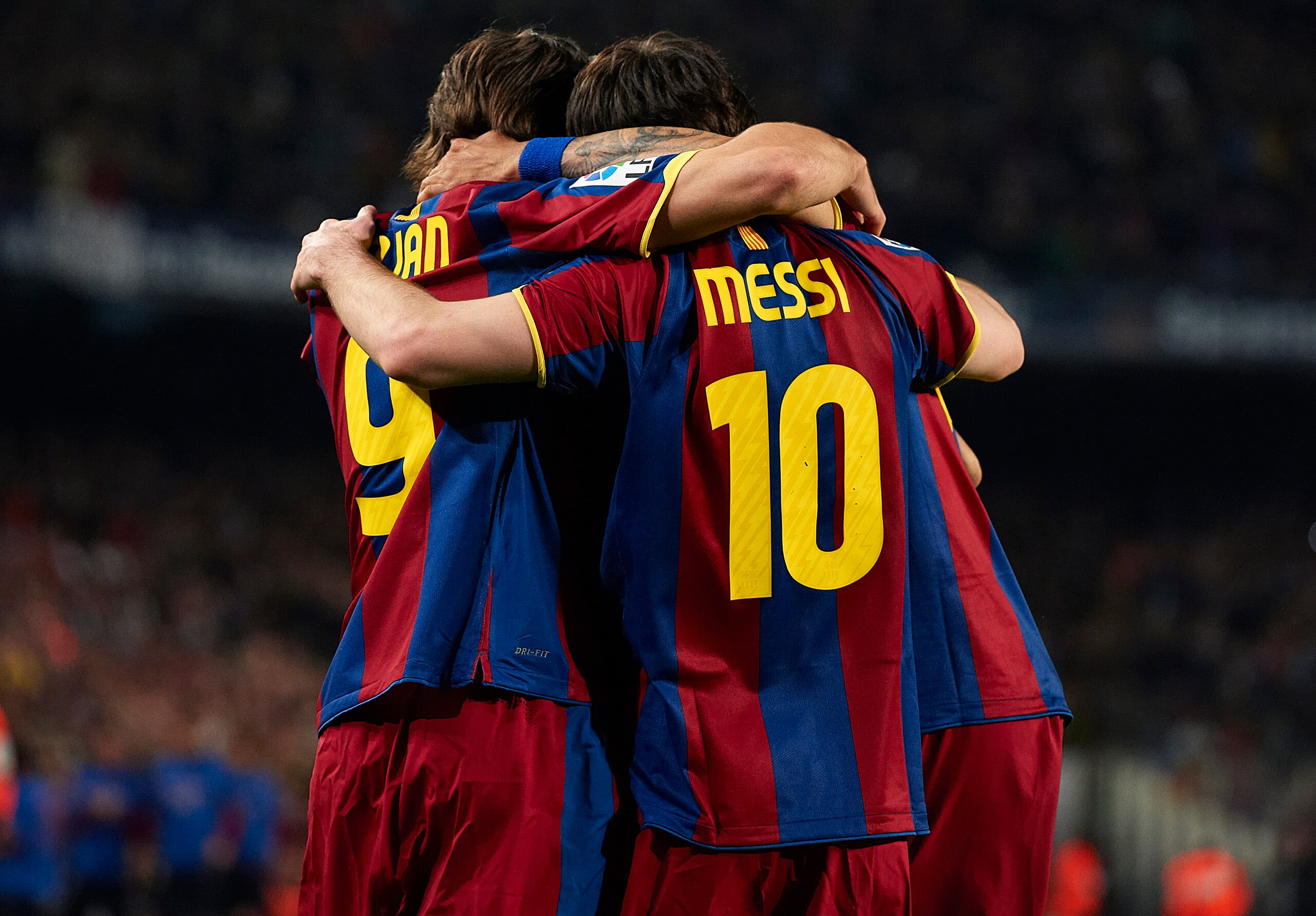BARCELONA, SPAIN - MARCH 19:  Barcelona players celebrate after team mate Daniel Alves scored the opening goal during the La Liga match between Barcelona and Getafe at Camp Nou on March 19, 2011 in Barcelona, Spain.  (Photo by Manuel Queimadelos Alonso/Ge