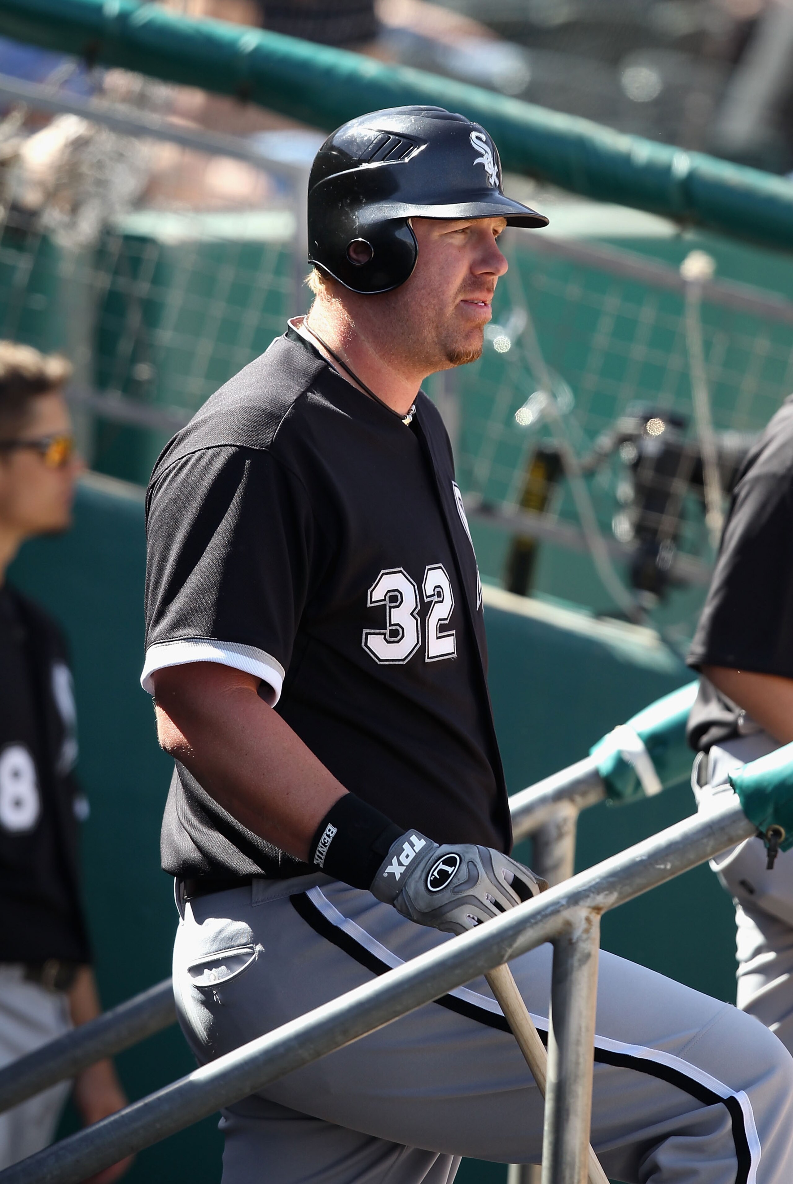 TUCSON, AZ - MARCH 07:  Adam Dunn #32 of the Chicago White Sox watches from the dugout during the spring training game against the Arizona Diamondbacks at Kino Veterans Memorial Stadium on March 7, 2011 in Tucson, Arizona. The charity game is to benefit t