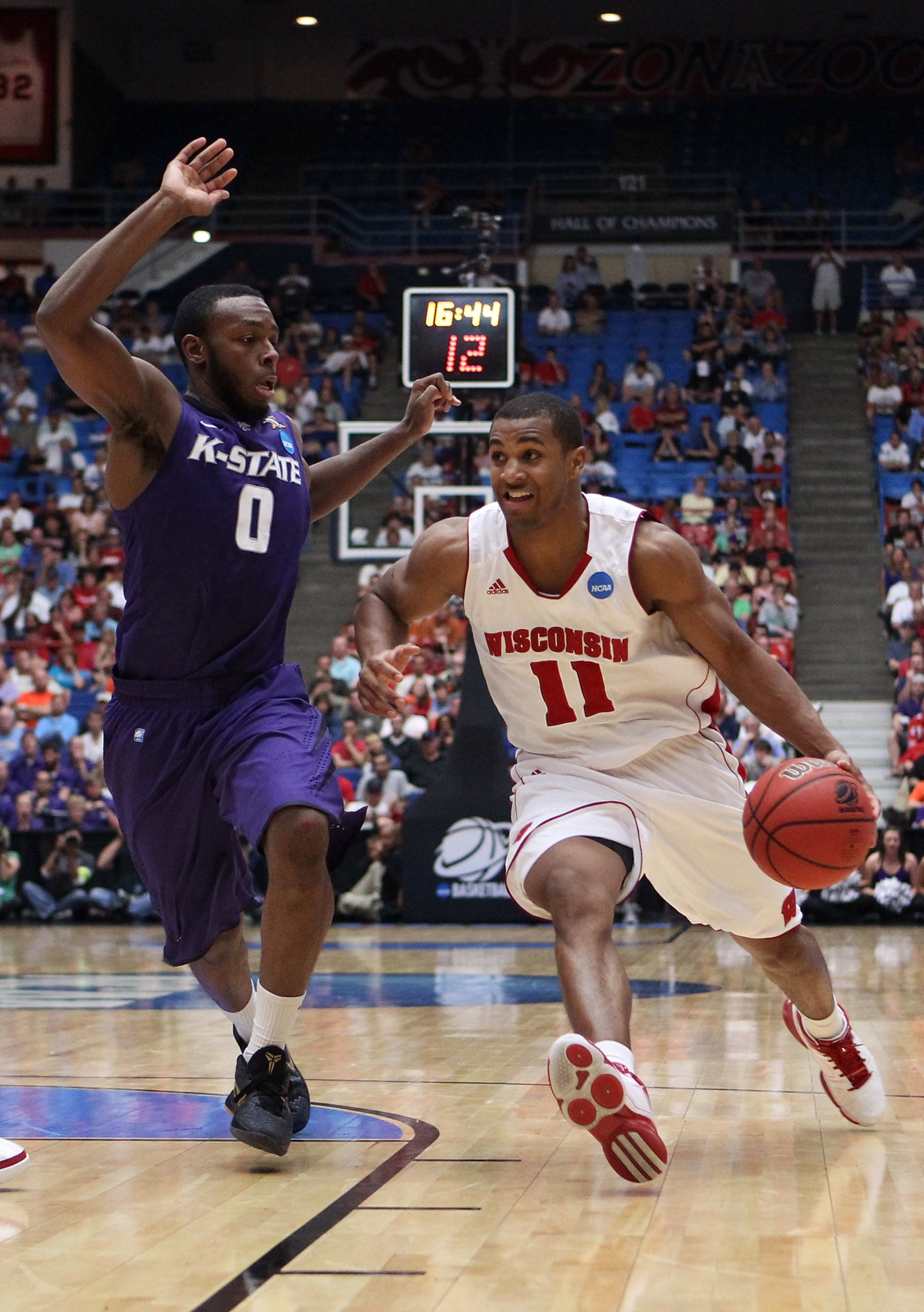 TUCSON, AZ - MARCH 19:  Jordan Taylor #11 of the Wisconsin Badgers drives against Jacob Pullen #0 of the Kansas State Wildcats during the third round of the 2011 NCAA men's basketball tournament at McKale Center on March 19, 2011 in Tucson, Arizona.  (Pho