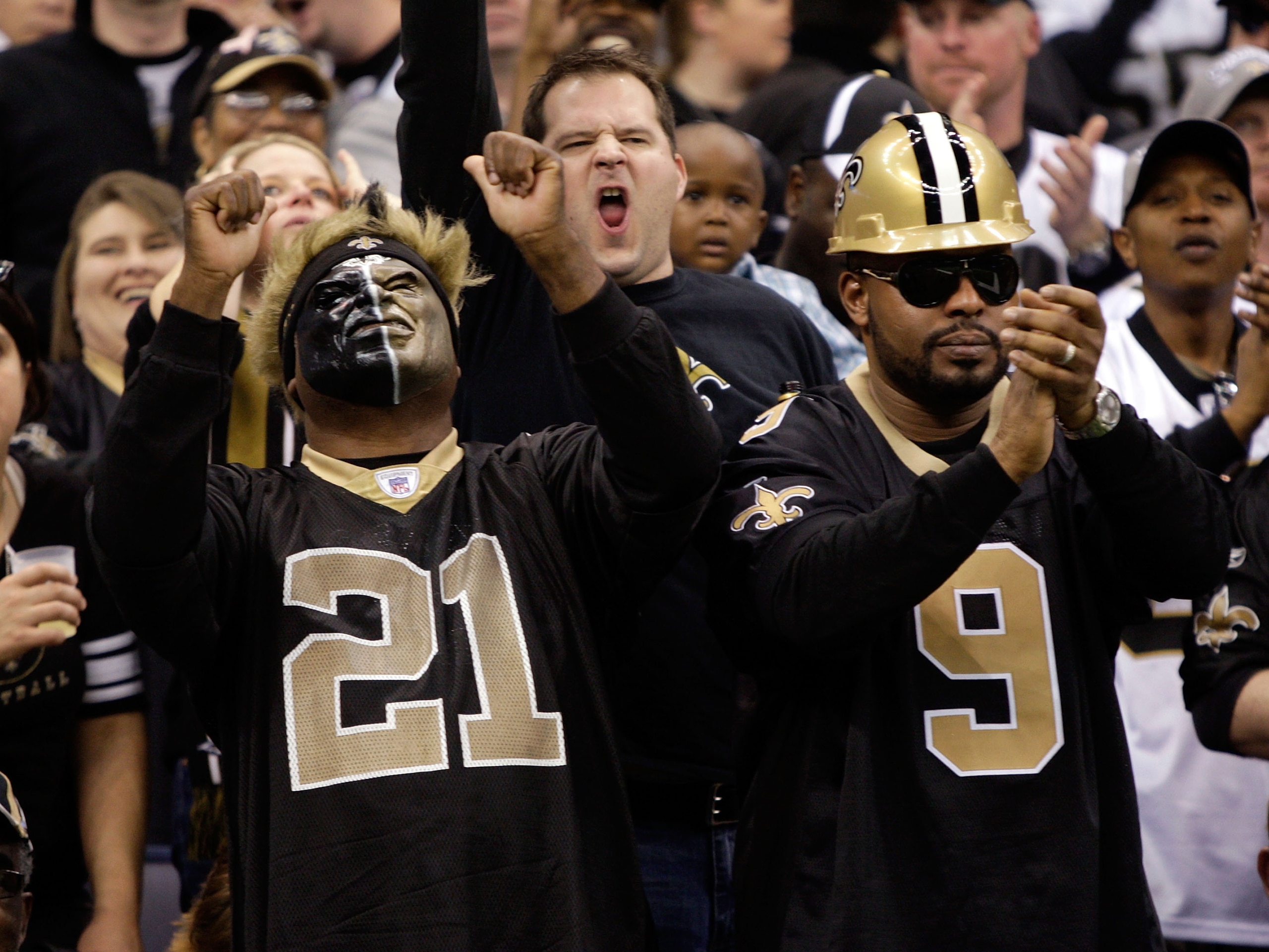 NEW ORLEANS - DECEMBER 27:  New Orleans Saints fans cheer during the game against the Tampa Bay Buccaneers on December 27, 2009 at Louisiana Superdome in New Orleans, Louisiana.  (Photo by Jamie Squire/Getty Images)