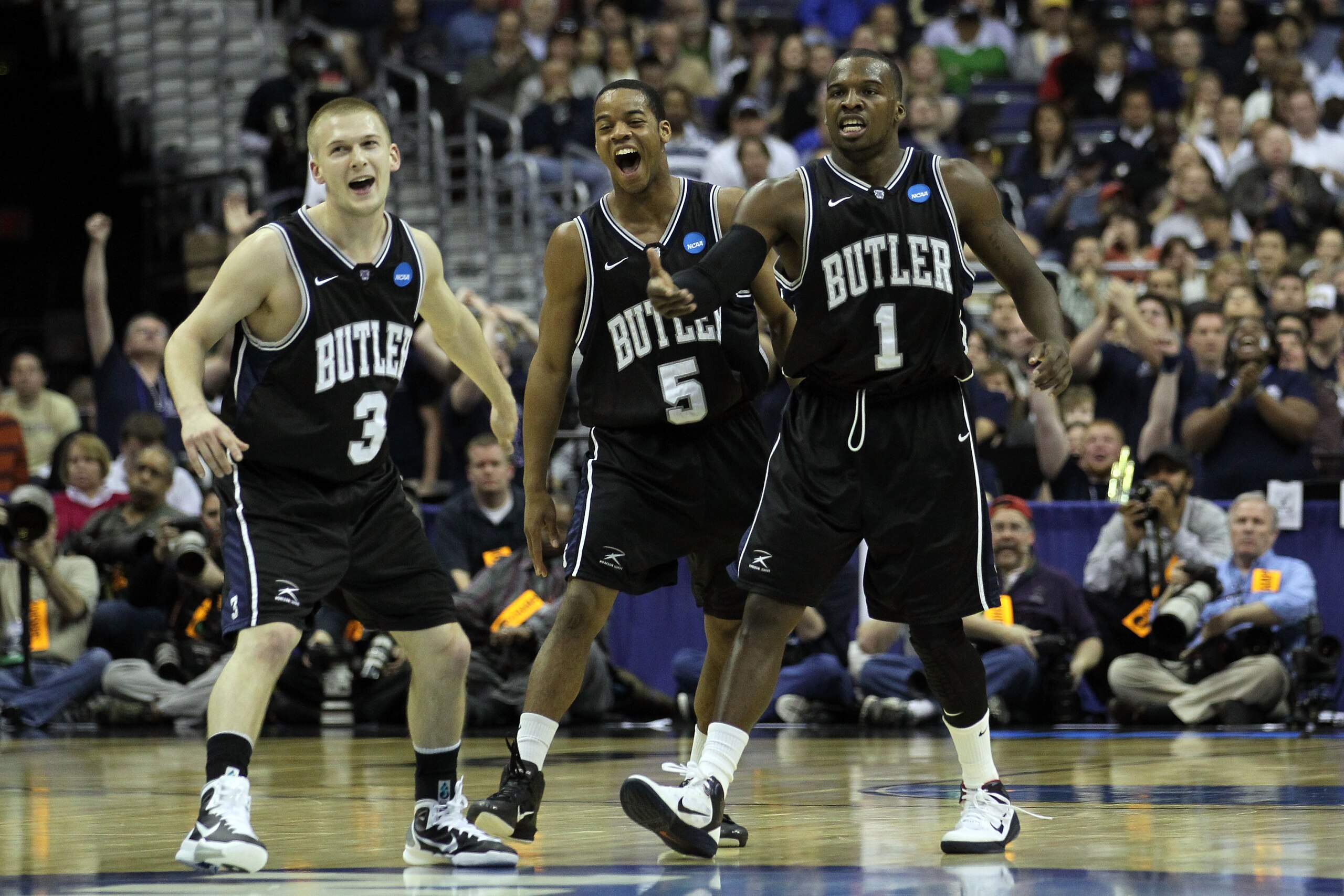 WASHINGTON - MARCH 19: Zach Hahn #3, Ronald Nored #5 and Shelvin Mack #1 of the Butler Bulldogs celebrate during their game against the Pittsburgh Panthers during the third round of the 2011 NCAA men's basketball tournament at Verizon Center on March 19, WASHINGTON - MARCH 19: Zach Hahn #3, Ronald Nored #5 and Shelvin Mack #1 of the Butler Bulldogs celebrate during their game against the Pittsburgh Panthers during the third round of the 2011 NCAA men's basketball tournament at Verizon Center on March 19,