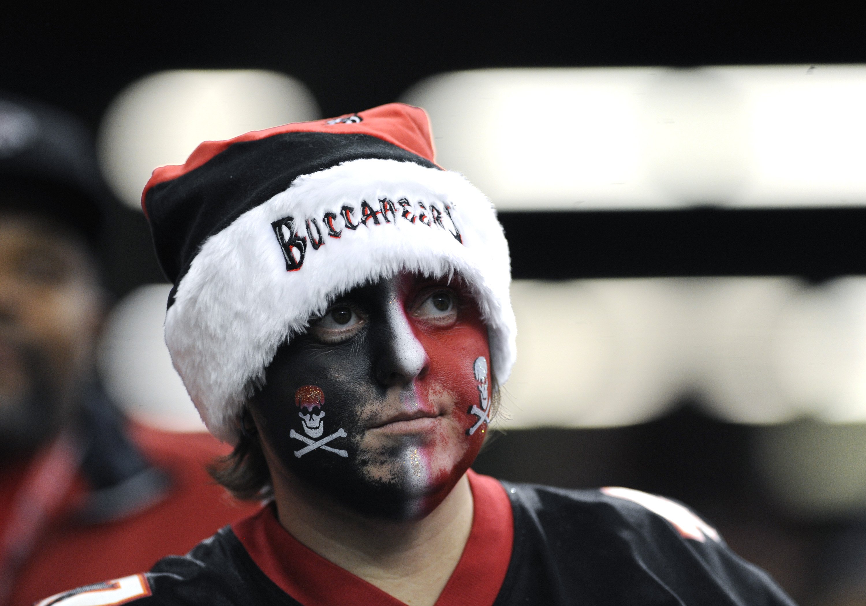 ATLANTA - DECEMBER 14: A fan of the Atlanta Falcons watches play  against the Tampa Bay Buccaneers  at the Georgia Dome on December 14, 2008 in Atlanta, Georgia.  (Photo by Al Messerschmidt/Getty Images)