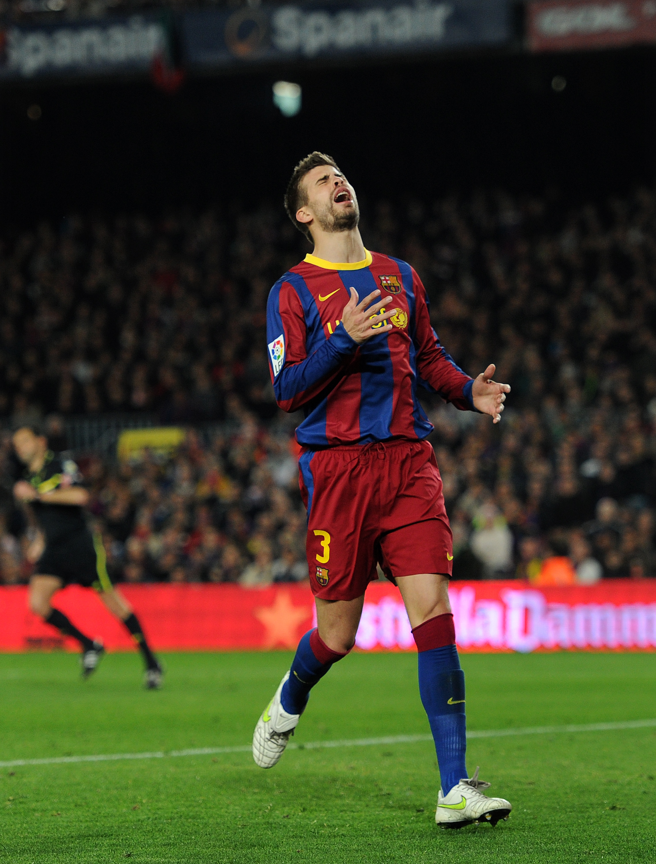 BARCELONA, SPAIN - MARCH 05:  Gerard Pique of Barcelona reacts as he fails to score during the la Liga match between Barcelona and Real Zaragoza at the Camp Nou stadium on March 5, 2011 in Barcelona, Spain.  (Photo by Jasper Juinen/Getty Images)