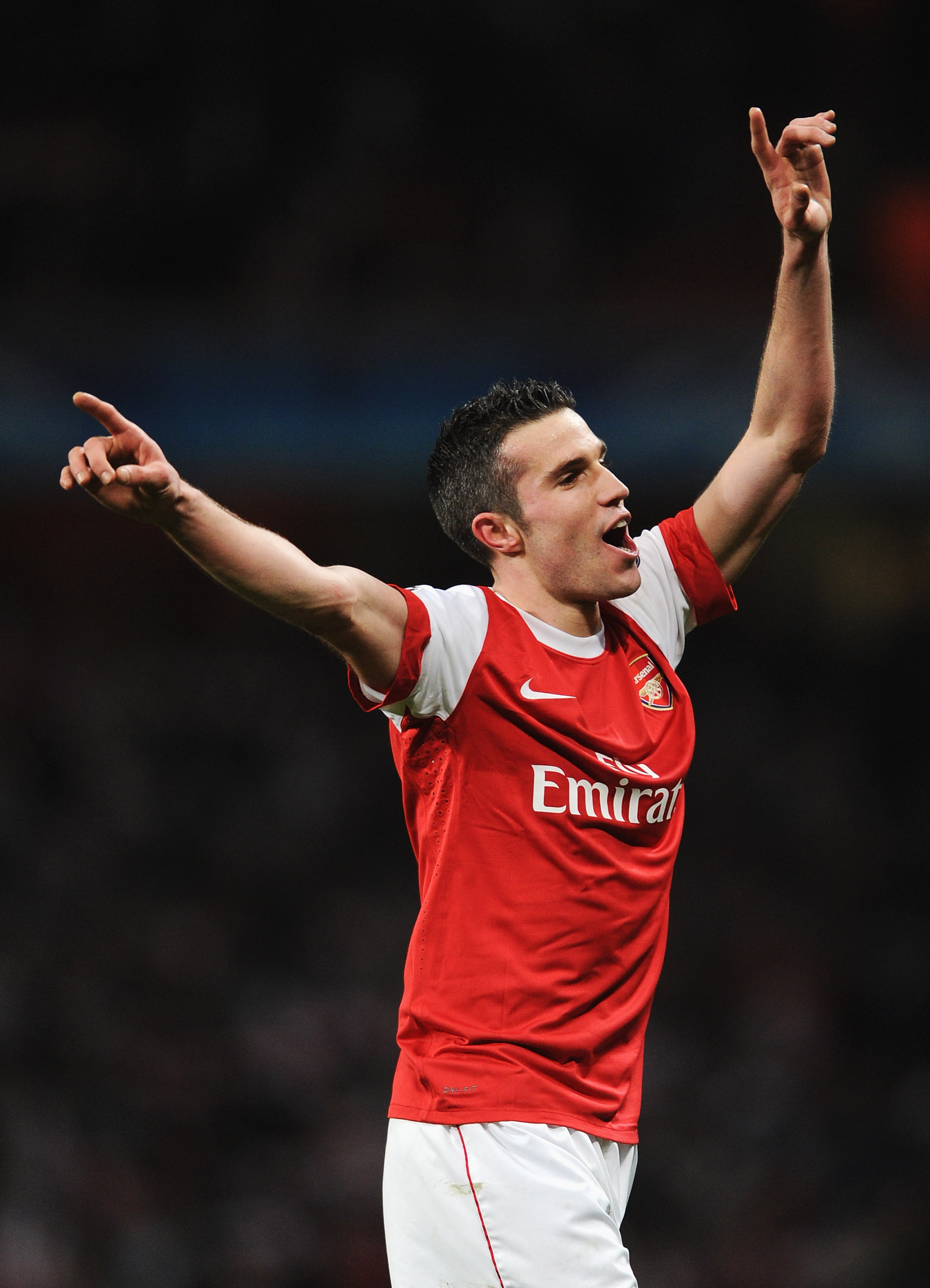LONDON, ENGLAND - FEBRUARY 16:  Robin van Persie of Arsenal celebrates victory after the UEFA Champions League round of 16 first leg match between Arsenal and Barcelona at the Emirates Stadium on February 16, 2011 in London, England.  (Photo by Jasper Jui