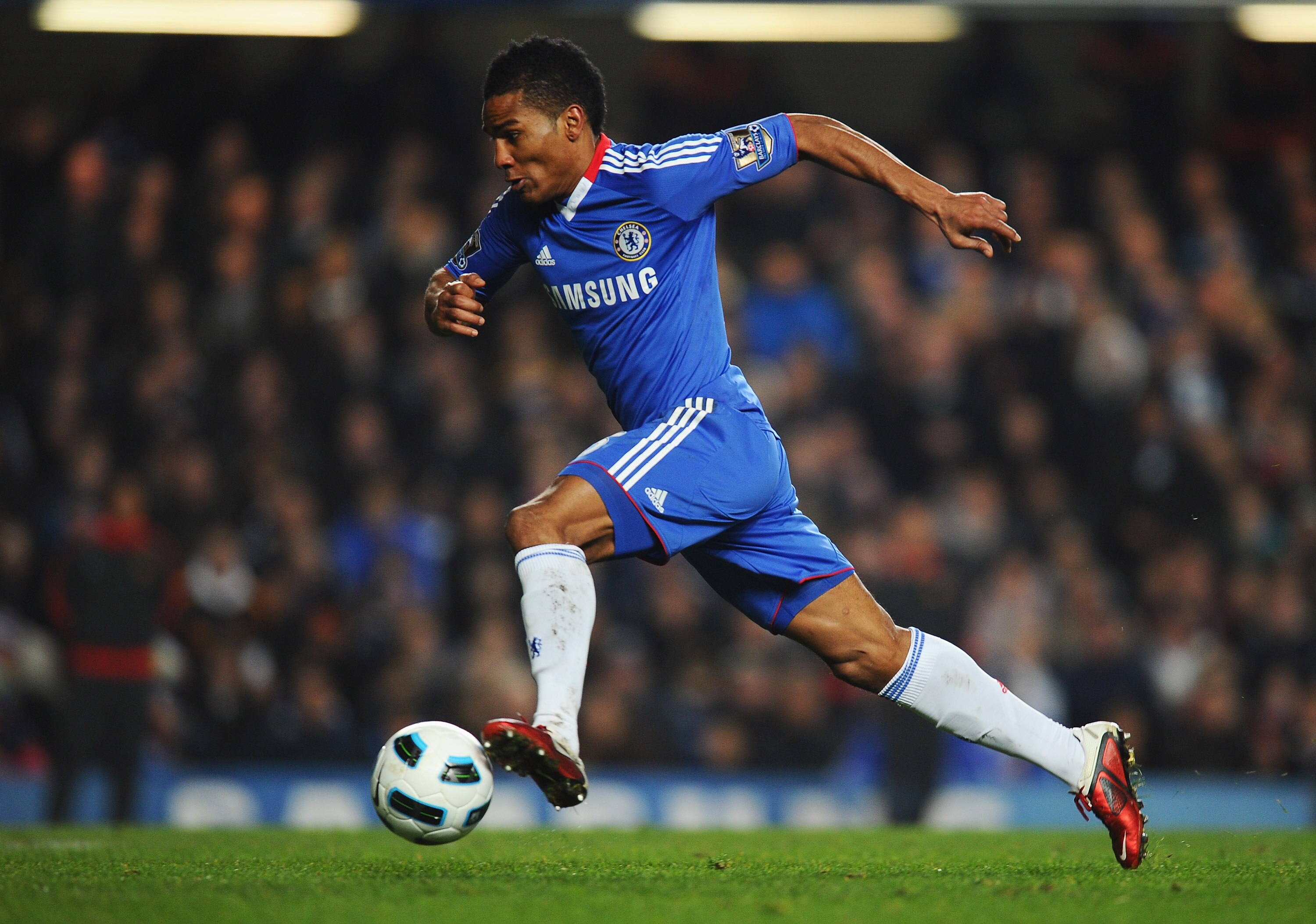 LONDON, ENGLAND - MARCH 01: Florent Malouda of Chelsea in action during the Barclays Premier League match between Chelsea and Manchester United at Stamford Bridge on March 1, 2011 in London, England.  (Photo by Clive Mason/Getty Images)