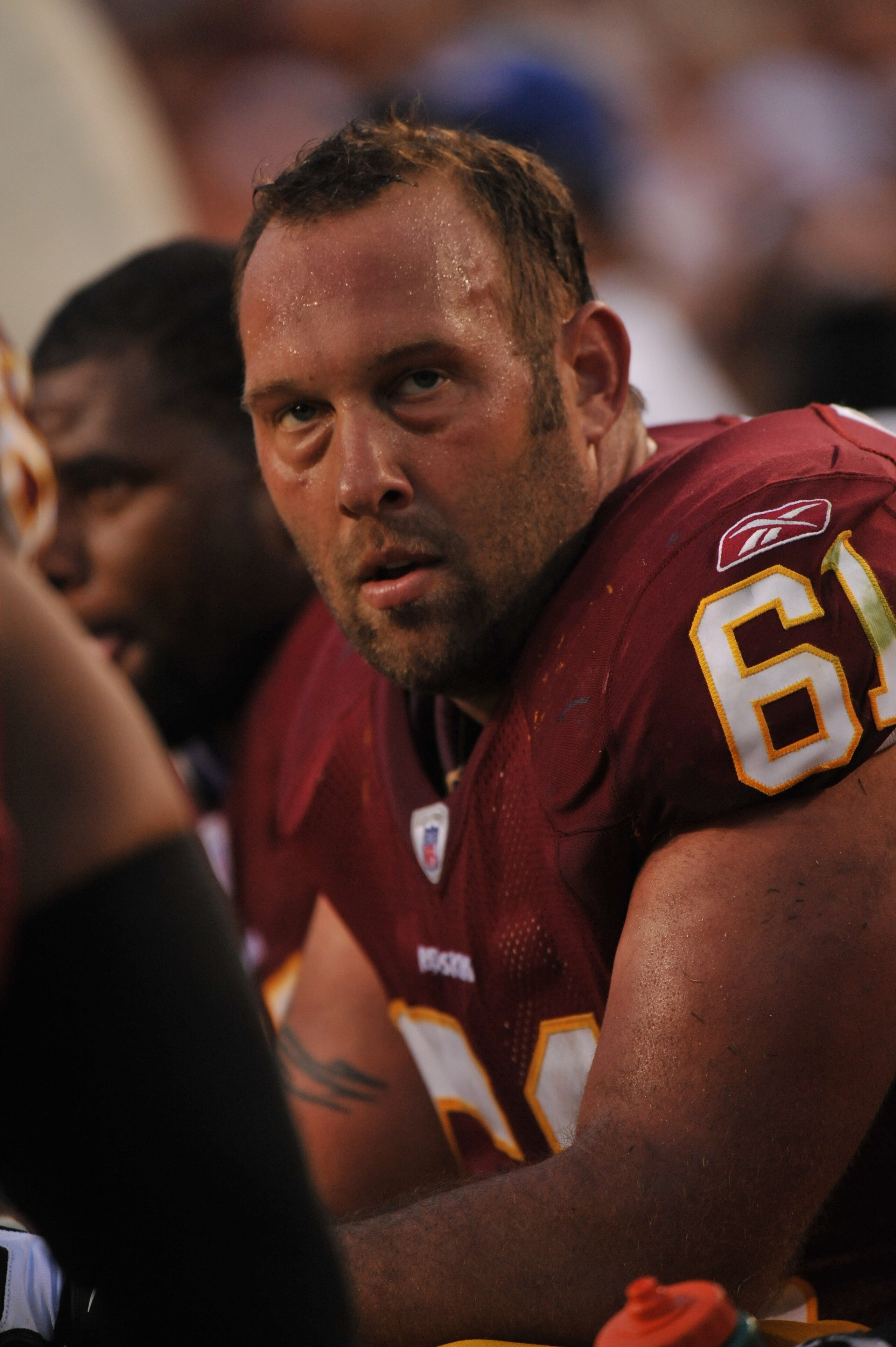 LANDOVER - SEPTEMBER 19:  Casey Rabach #61 of the Washington Redskins watches from the bench during the game against the Houston Texans at FedExField on September 19, 2010 in Landover, Maryland. The Texans defeated the Redskins in overtime 30-27. (Photo b