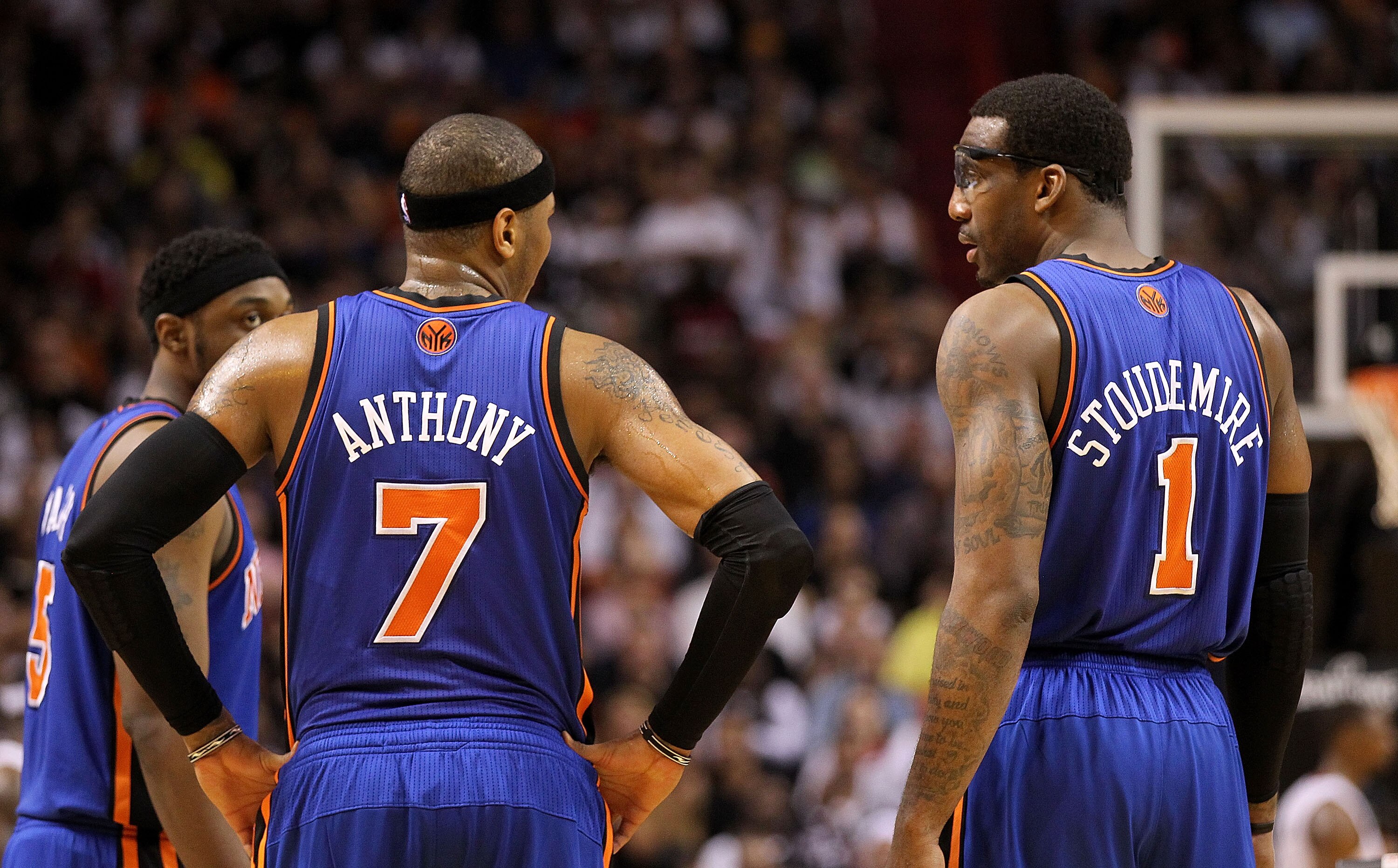 MIAMI, FL - FEBRUARY 27:  Carmelo Anthony #7 and Amar'e Stoudemire #1 of the New York Knicks talk during a game against the the Miami Heat at American Airlines Arena on February 27, 2011 in Miami, Florida. NOTE TO USER: User expressly acknowledges and agr