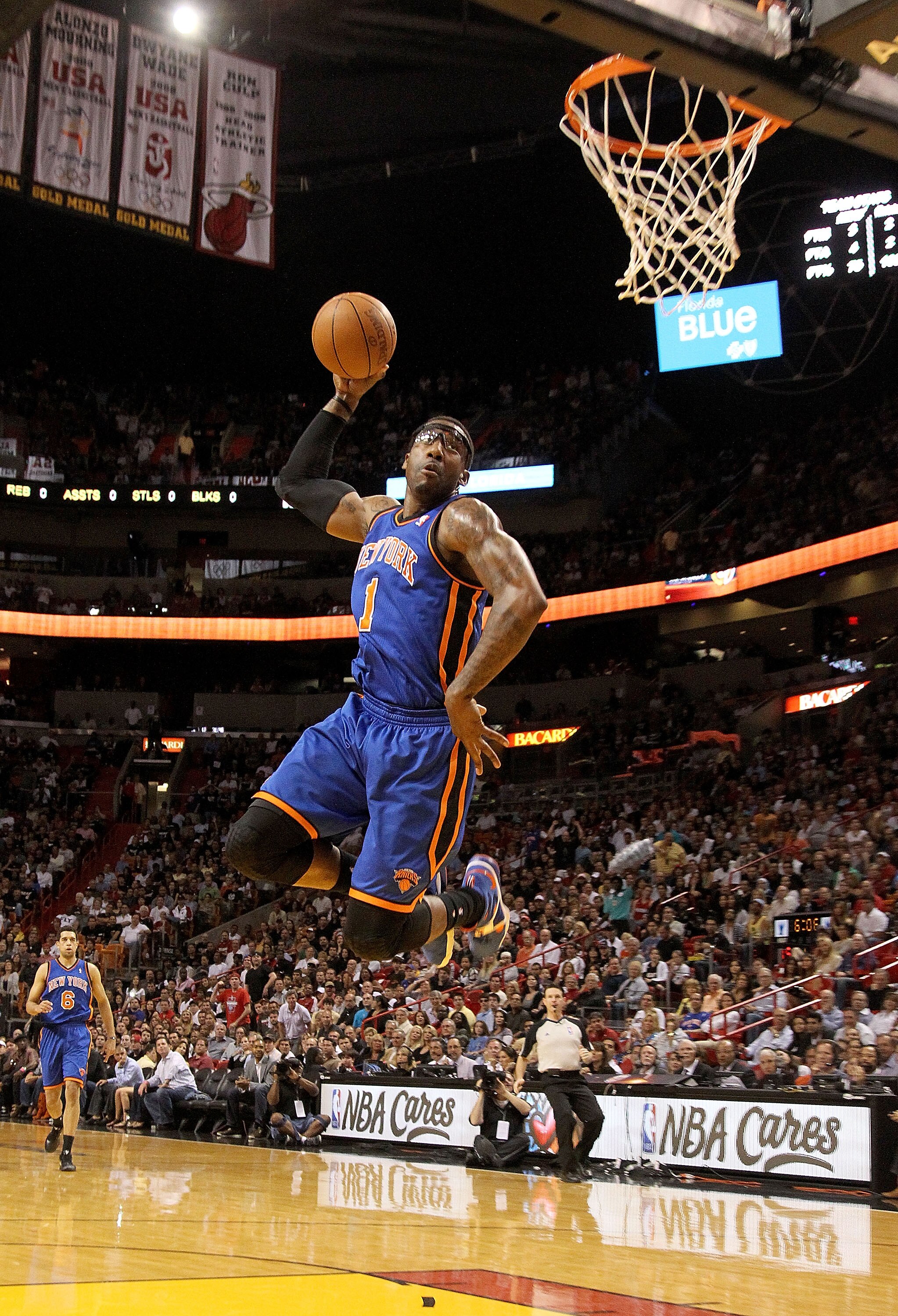 MIAMI, FL - FEBRUARY 27:  Amar'e Stoudemire #1 of the New York Knicks dunks during a game against the Miami Heat at American Airlines Arena on February 27, 2011 in Miami, Florida. NOTE TO USER: User expressly acknowledges and agrees that, by downloading a