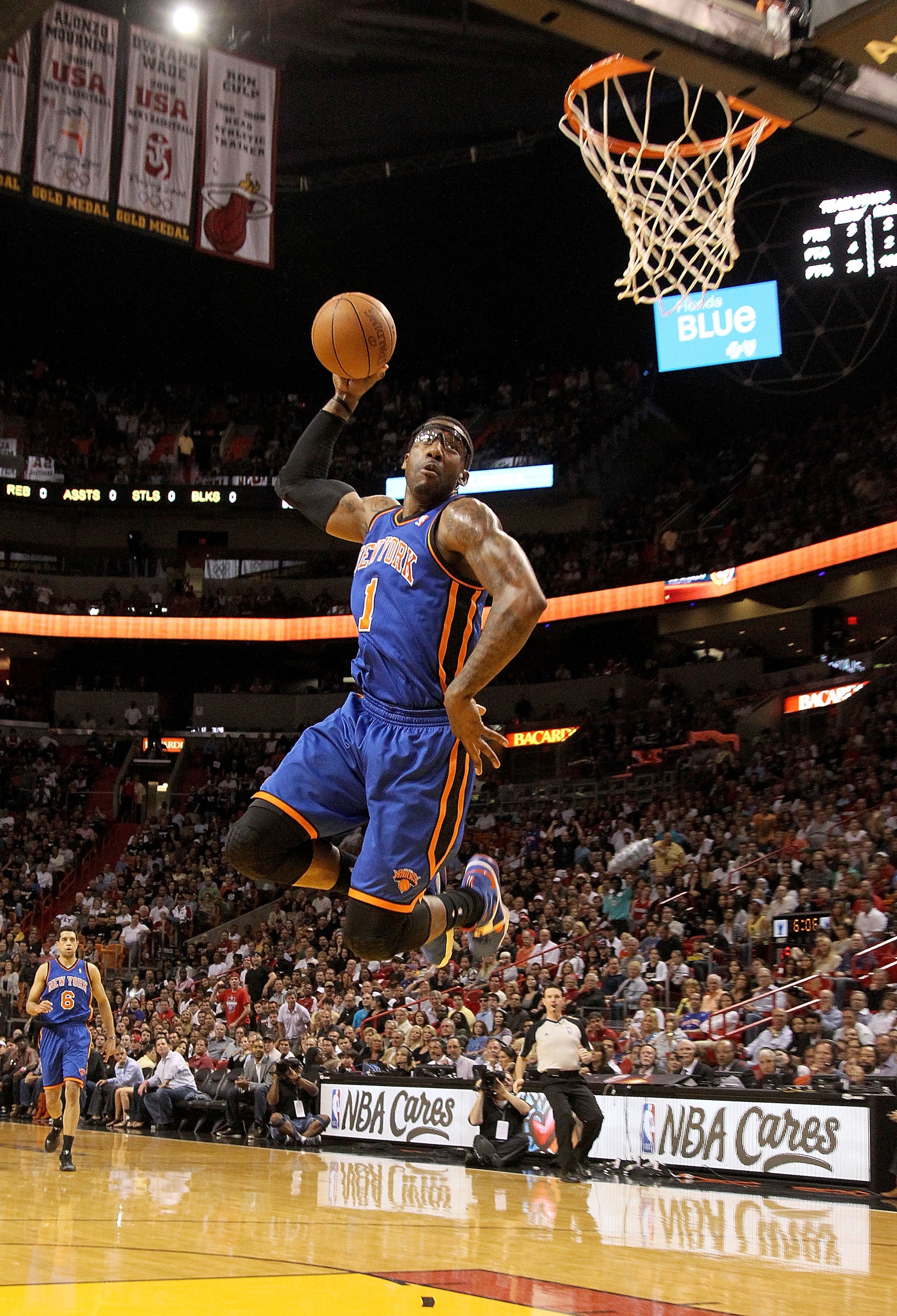 MIAMI, FL - FEBRUARY 27:  Amar'e Stoudemire #1 of the New York Knicks dunks during a game against the Miami Heat at American Airlines Arena on February 27, 2011 in Miami, Florida. NOTE TO USER: User expressly acknowledges and agrees that, by downloading a