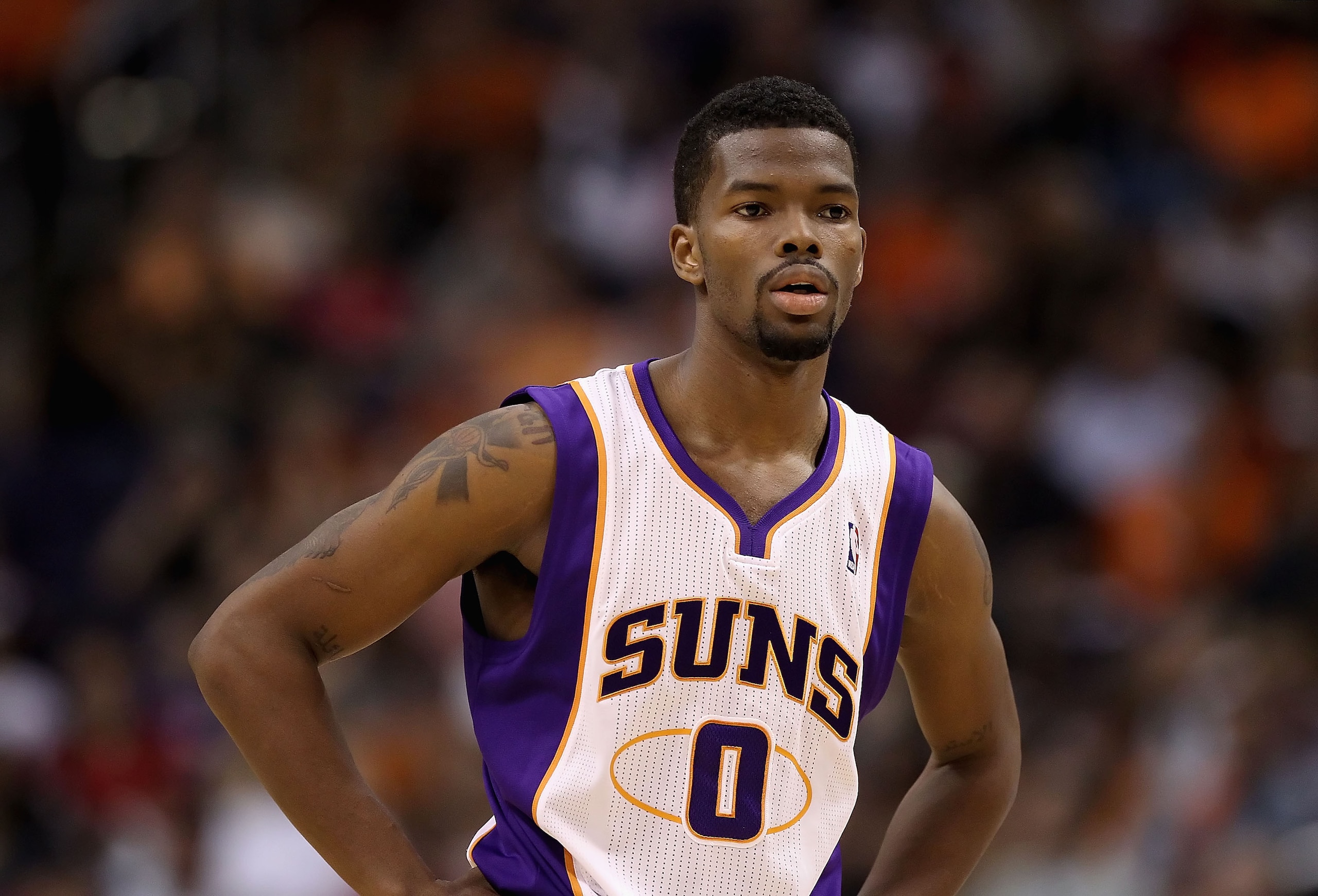 PHOENIX, AZ - MARCH 13:  Aaron Brooks #0 of the Phoenix Sun during the NBA game against the Orlando Magic at US Airways Center on March 13, 2011 in Phoenix, Arizona. The Magic defeated the Suns 111-88. NOTE TO USER: User expressly acknowledges and agrees