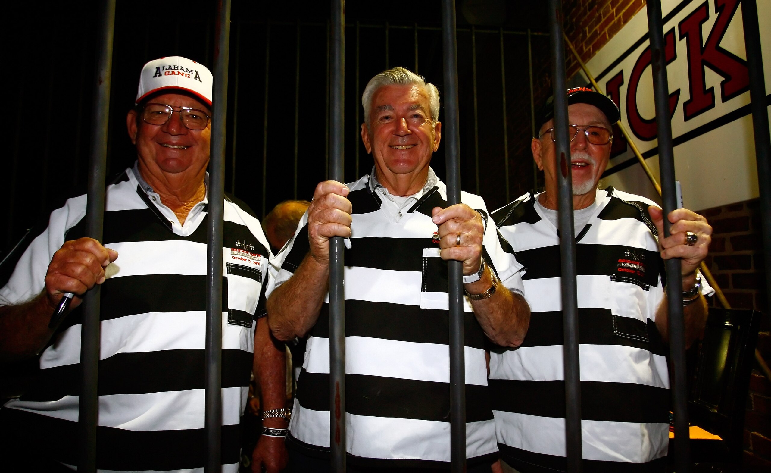 DAVIDSON, NC - OCTOBER 12:  Former NASCAR drivers known as the 'Alabama Gang' (L-R) Donnie Allison, Bobby Allison, and Red Farmer, sit inside a jail cell to raise money during the NASCAR third annual Jail & Bail held at Brickhouse Tavern on October 12, 20