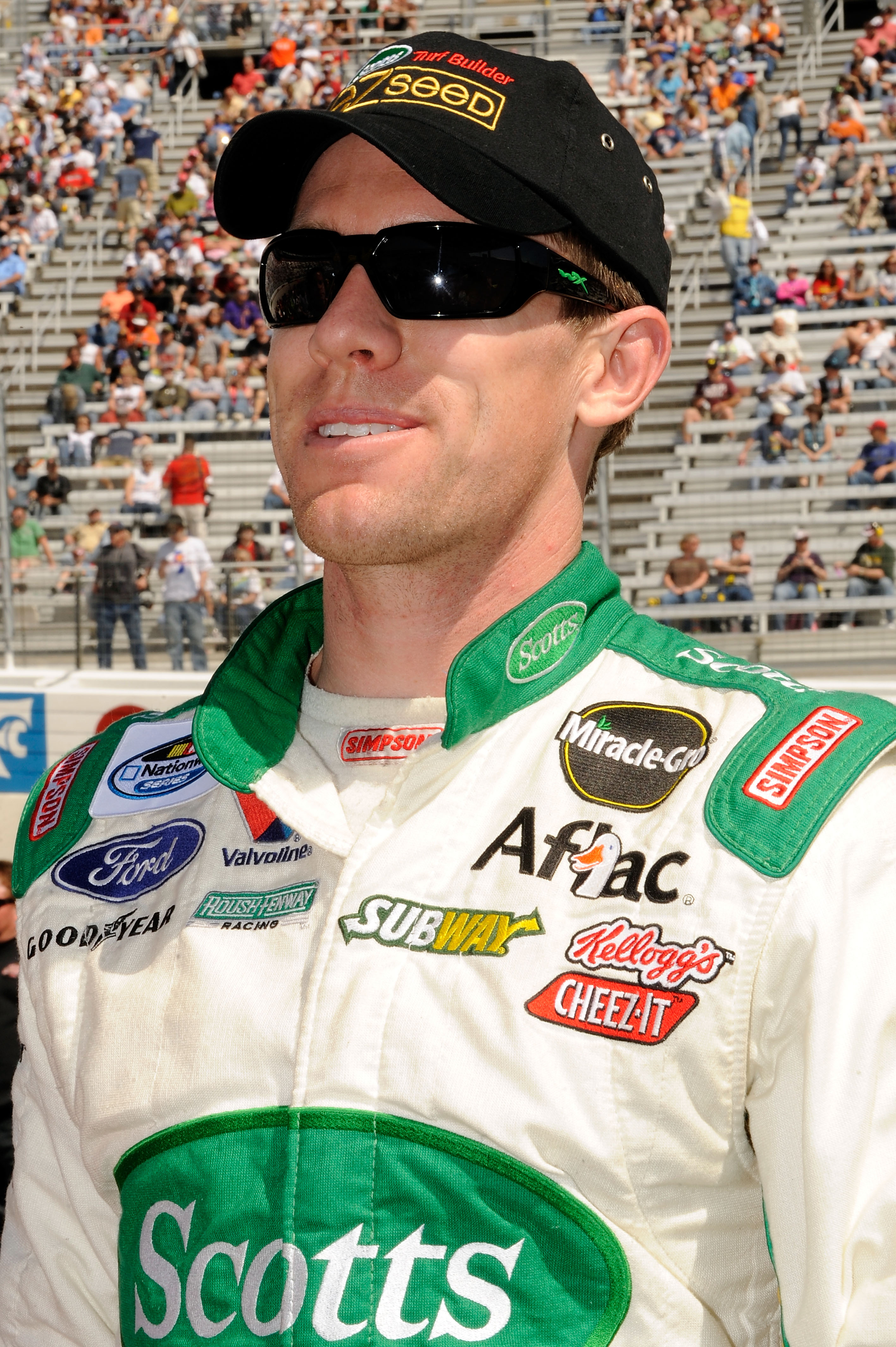 BRISTOL, TN - MARCH 19:  Carl Edwards, driver of the #60 Scotts EZ Seed Ford, stands next to his car on the grid prior to the start of the NASCAR Nationwide Series Scotts EZ Seed 300 at Bristol Motor Speedway on March 19, 2011 in Bristol, Tennessee.  (Pho