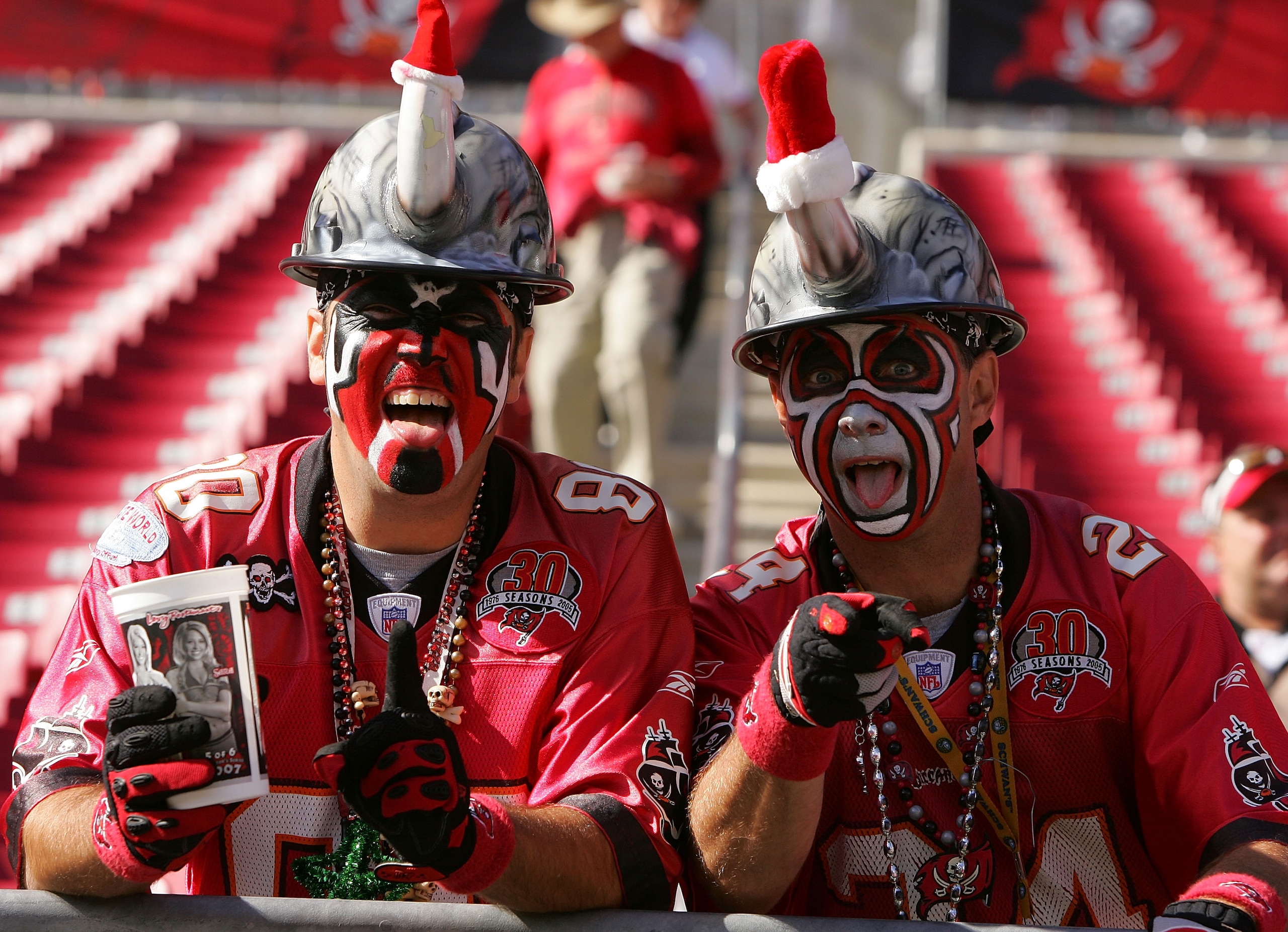 TAMPA, FL - DECEMBER 16: Tampa Bay Buccaneer fans show their support ina game against the Atlanta Falcons at Raymond James Stadium on December16, 2007 in Tampa, Florida.  (Photo by Sam Greenwood/Getty Images)