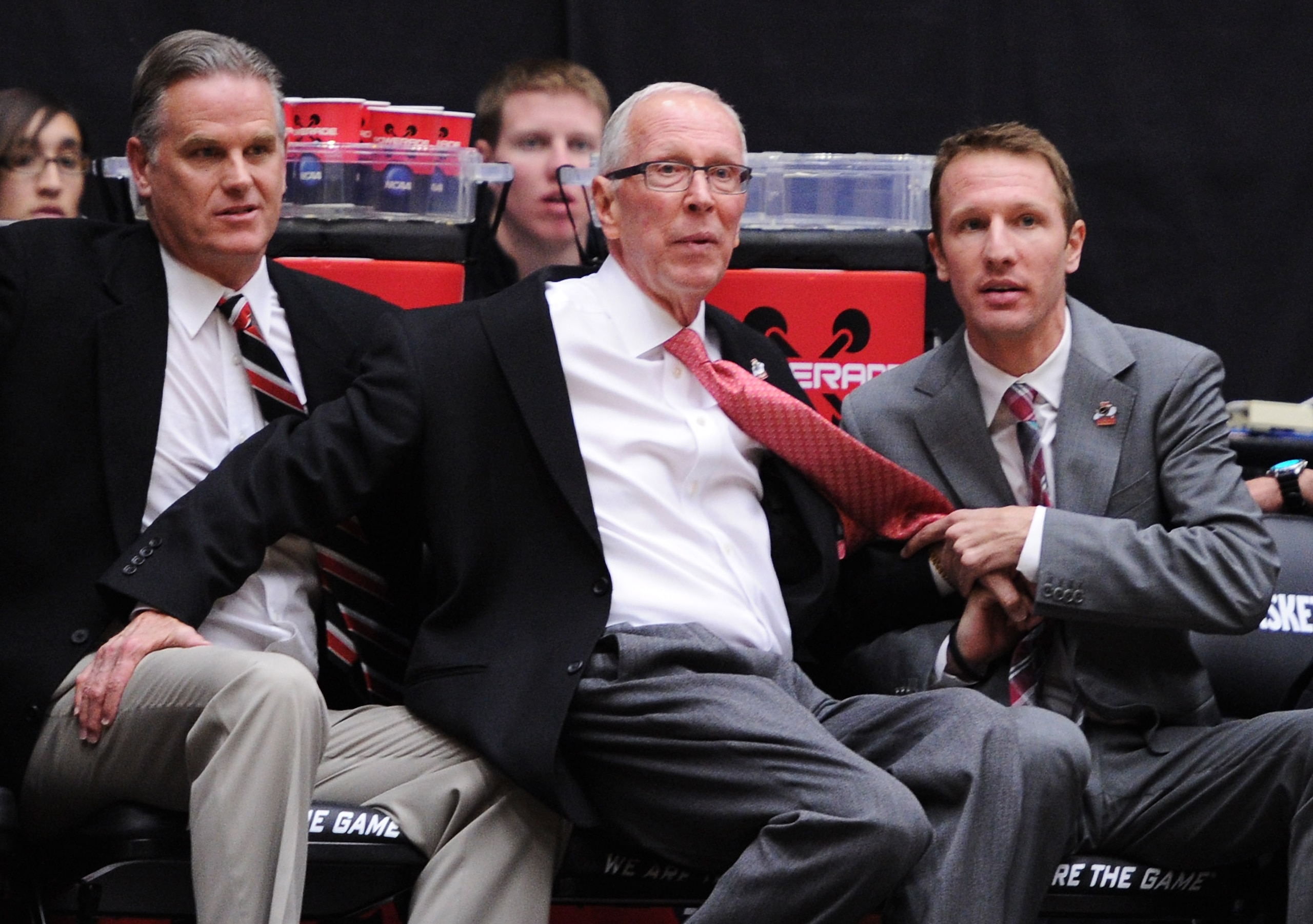 TUCSON, AZ - MARCH 19:  Head coach Steve Fisher (C) of the San Diego State Aztecs stumbles during their game against the Temple Owls during the third round of the 2011 NCAA men's basketball tournament at McKale Center on March 19, 2011 in Tucson, Arizona.