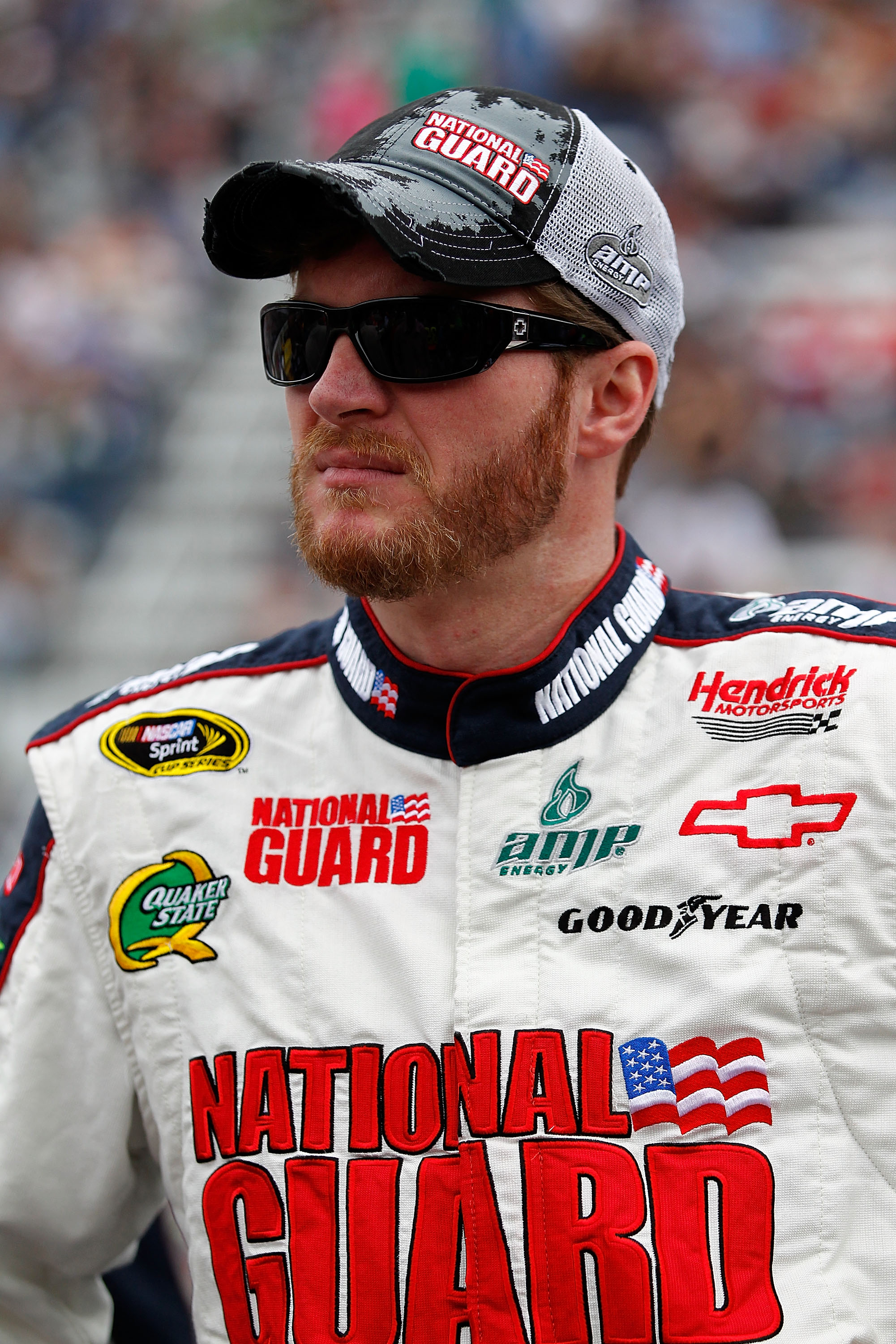 BRISTOL, TN - MARCH 20: Dale Earnhardt Jr., driver of the #88 National Guard/AMP Energy Chevrolet, stands on the grid prior to the start of the NASCAR Sprint Cup Series Jeff Byrd 500 Presented By Food City at Bristol Motor Speedway on March 20, 2011 in Br