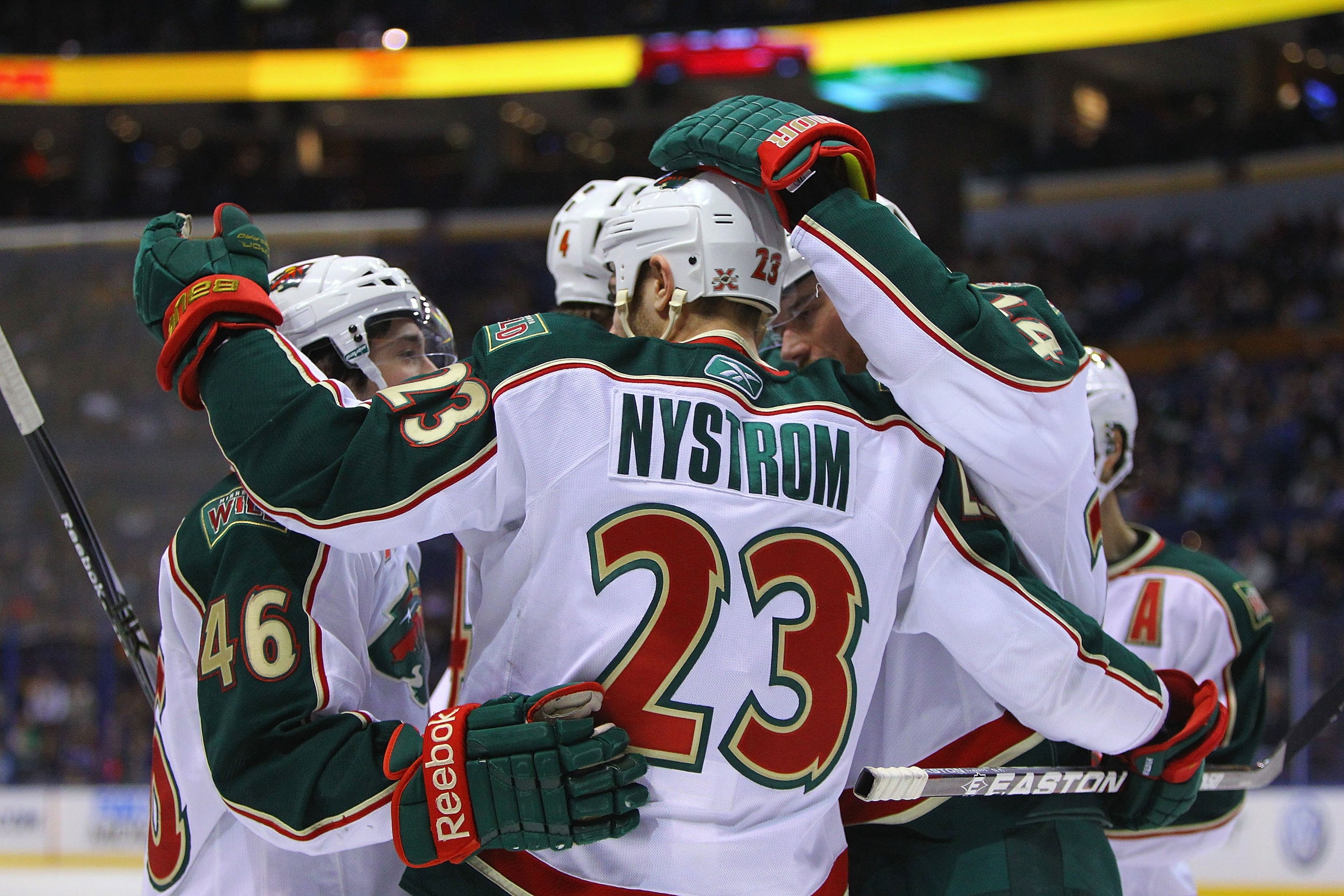 ST. LOUIS, MO - MARCH 29: Eric Nystrom #23 of the Minnesota Wild is congratulated by teammates after scoring a goal against the St. Louis Blues at the Scottrade Center on March 29, 2011 in St. Louis, Missouri.  (Photo by Dilip Vishwanat/Getty Images)