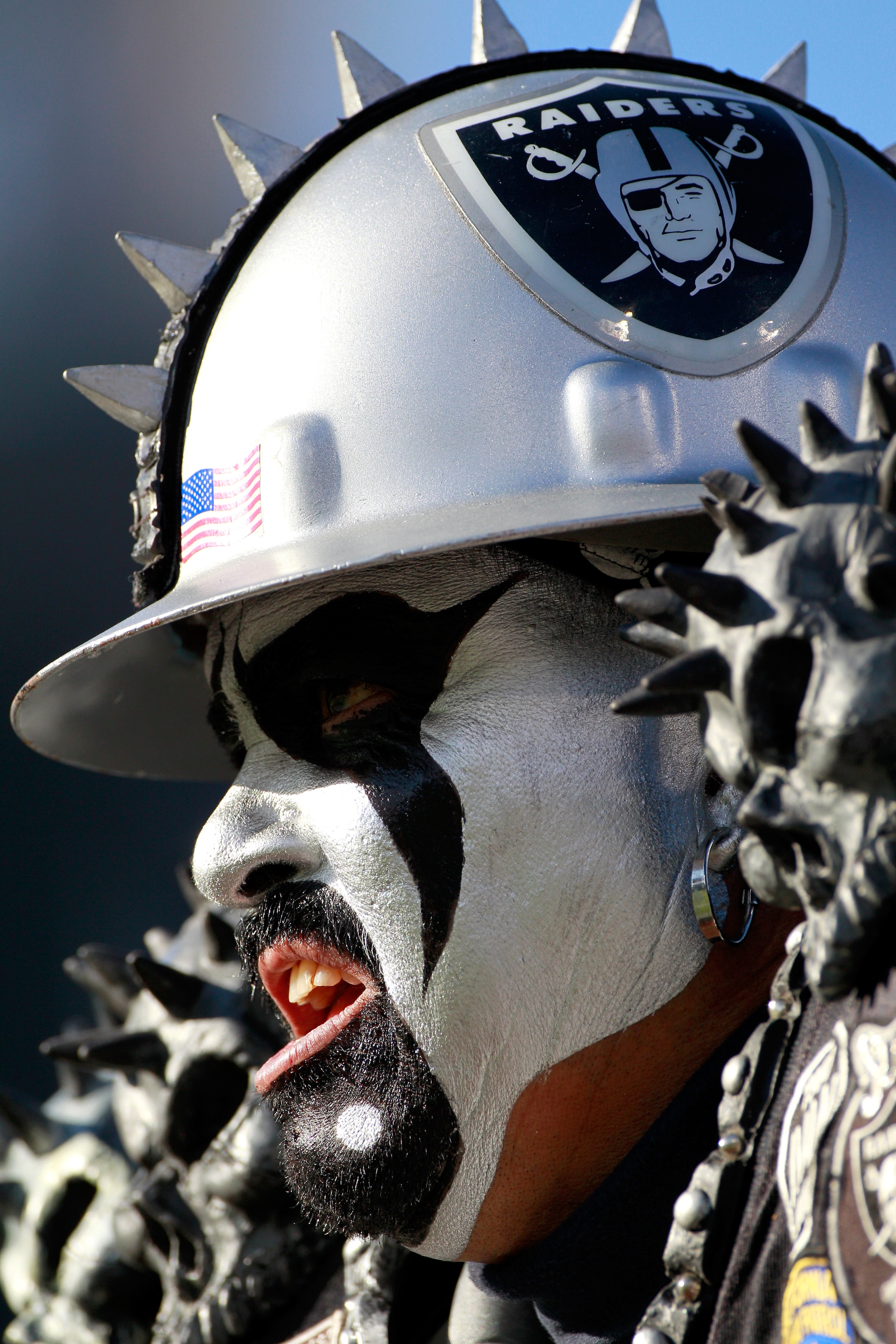 JACKSONVILLE, FL - DECEMBER 12:  A fan of the Oakland Raiders cheers during the game against the Jacksonville Jaguars at EverBank Field on December 12, 2010 in Jacksonville, Florida.  (Photo by Sam Greenwood/Getty Images)