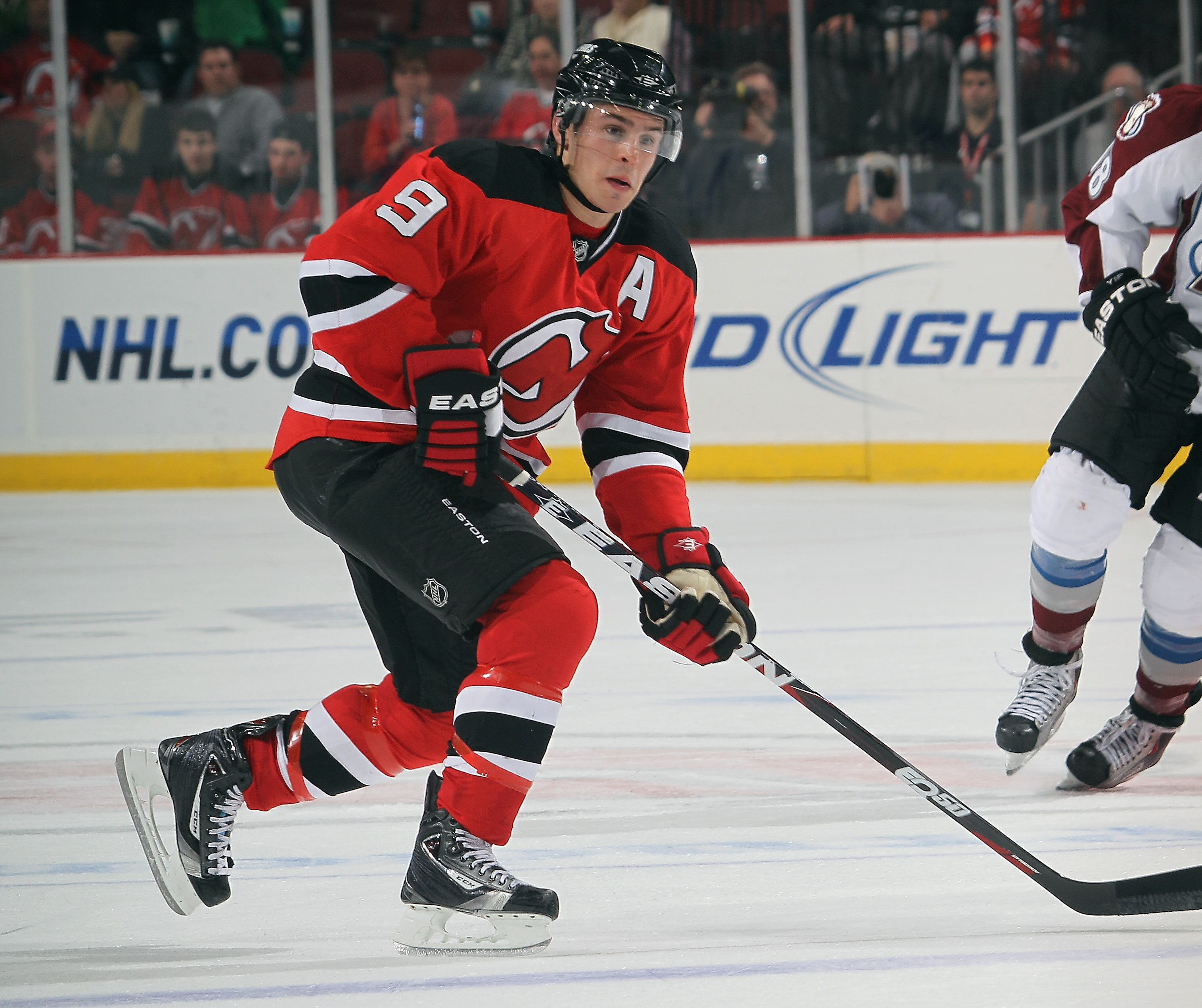 NEWARK, NJ - OCTOBER 15:  Zach Parise #9 of the New Jersey Devils skates against the Colorado Avalanche at the Prudential Center on October 15, 2010 in Newark, New Jersey.  (Photo by Bruce Bennett/Getty Images)
